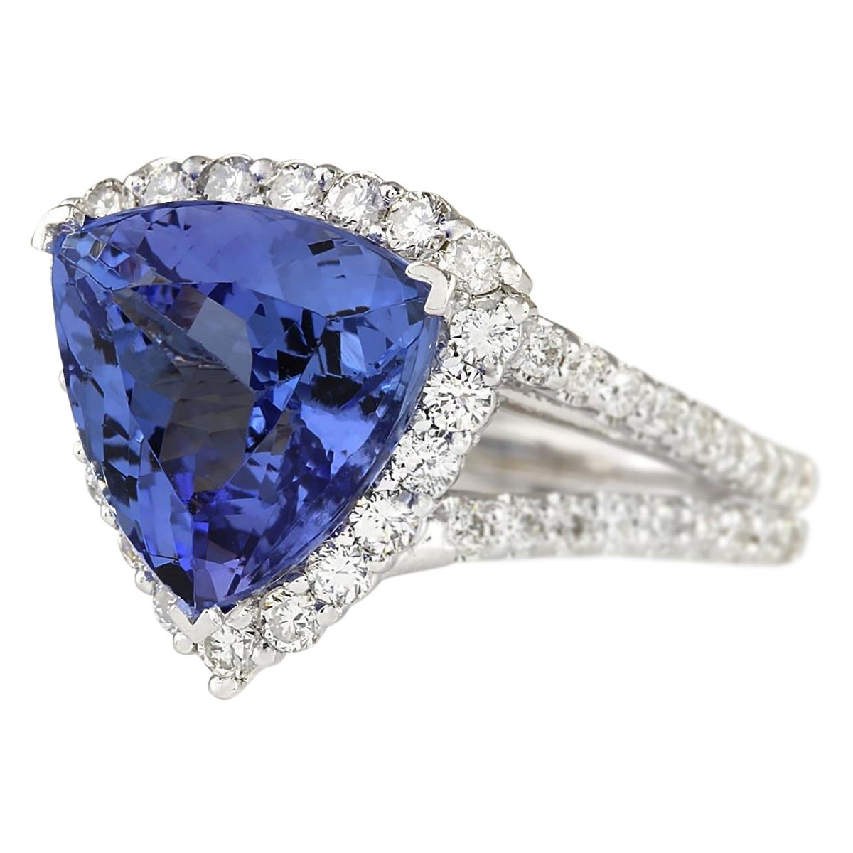 7.07 Carat Tanzanite 14 Karat White Gold Diamond Ring
Stamped: 14K White Gold
Total Ring Weight: 6.3 Grams
Total  Tanzanite Weight is 5.41 Carat (Measures: 11.50x11.50 mm)
Color: Blue
Total  Diamond Weight is 1.66 Carat
Color: F-G, Clarity: