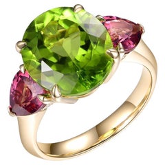 7.08 Carat Peridot Garnet and Diamond Ring in 14 Karat Yellow Gold