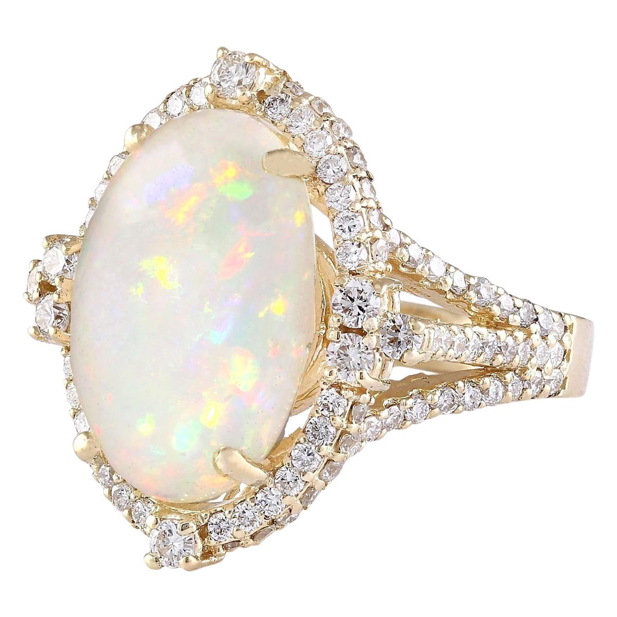 Introducing our exquisite 7.09 Carat Opal 14K Yellow Gold Diamond Ring, a stunning blend of luxury and elegance. Crafted from authentic 14K Yellow Gold and stamped for authenticity, this ring boasts a total weight of 9.3 grams, ensuring both quality