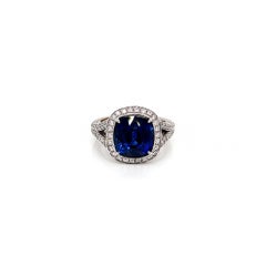 7.09 Total Carat Sapphire and Diamond Halo Pave-Set Ladies Engagement Ring