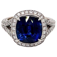 7.09 Total Carat Sapphire and Diamond Halo Pave-Set Ladies Engagement Ring