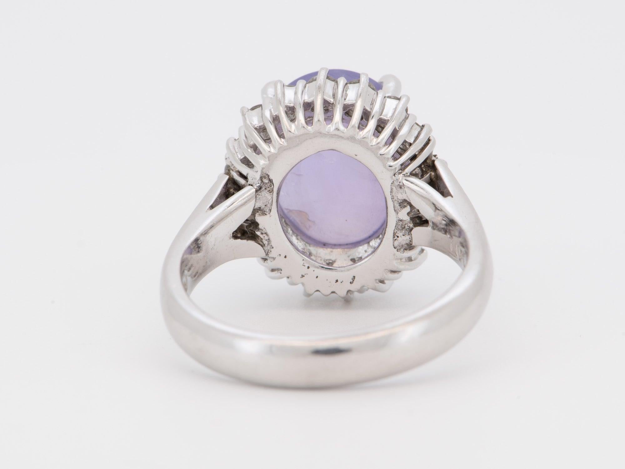 ♥ 7.09ct Lilac Purple Star Sapphire Engagement Ring Platinum Heavy 9g+ V1165
♥ This item measures 15.4mm in length (North South direction), 14.7mm in width (East West direction), and sits 9.2mm tall from the finger. Band width is 3.2mm.


♥