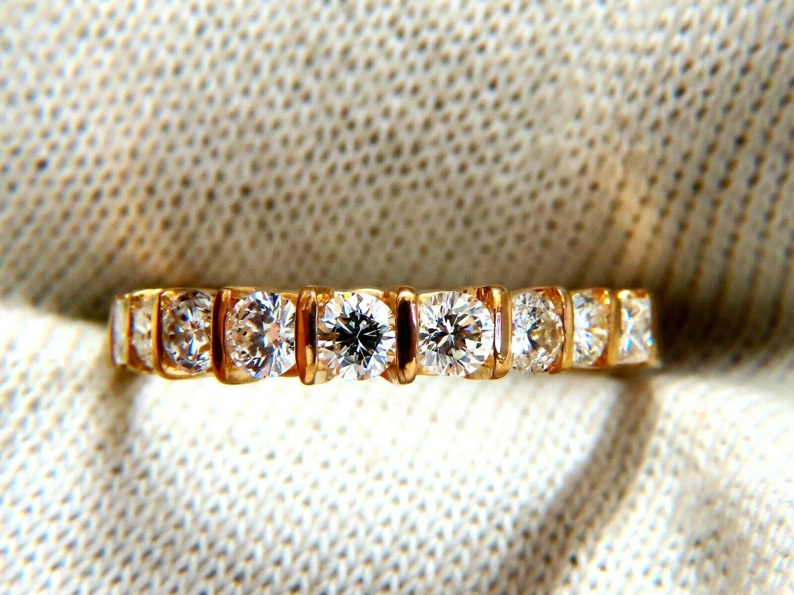 Channel Cathedral Band.

.70ct. Natural round cut brilliant diamonds

Durable Built.

Vs-2 clarity  G color.

18kt yellow gold.

2.7 Grams

Overall ring: 3.3mm diameter

Depth: 4.5mm

Current ring size: 6.75

May professionally resize, please