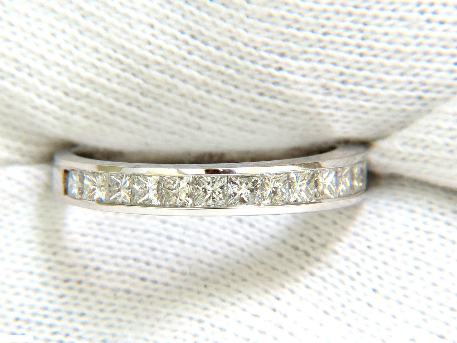 Modern prime

.70ct. Princess cut diamonds band

H-color, Vs-2 clarity

14kt. white gold.

2.7 grams

3.20mm wide

 size: 6.5

can resize, please inquire

$3000 appraisal will accompany