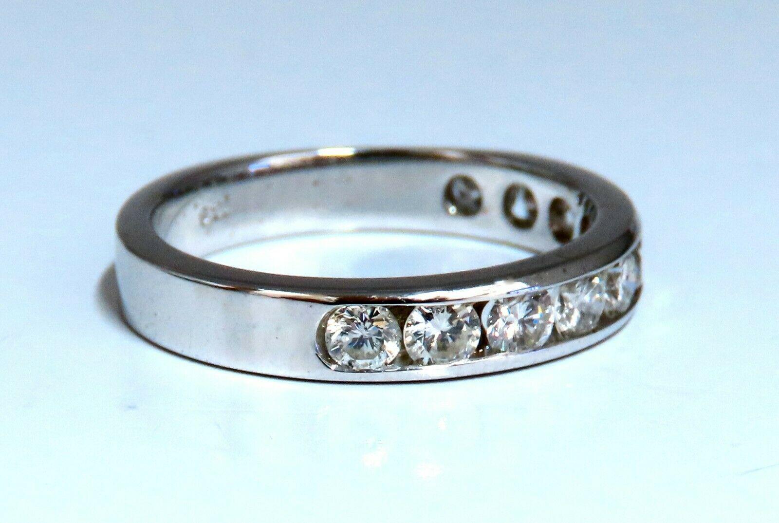 .70ct. Natural Round Cut Diamonds band 
I color / Si-1 clarity


Channel Set

4.2 grams
Size 8 and may resize.


4mm wide

2.2 mm depth

14kt. white gold


 $4000 Appraisal to accompany