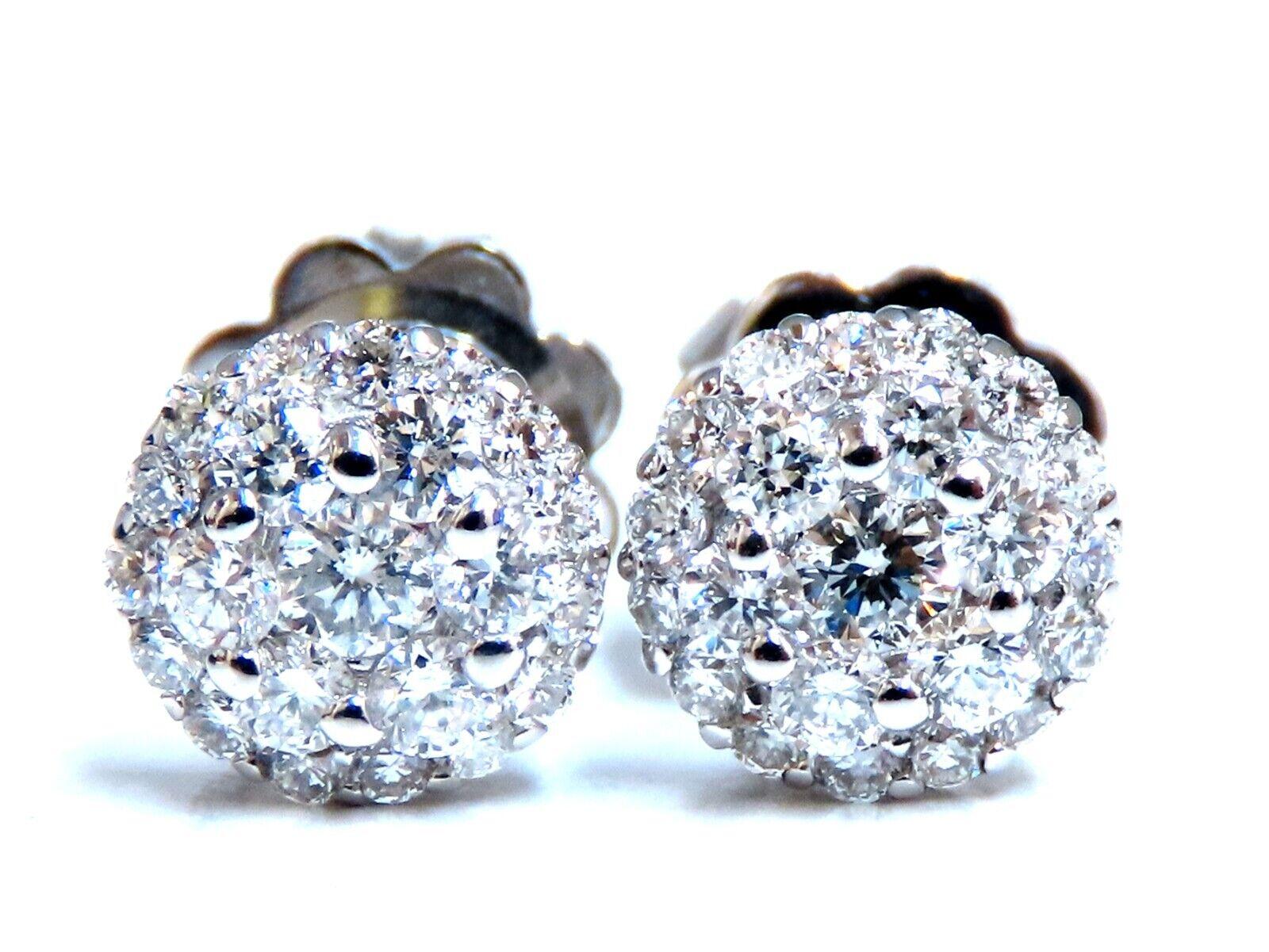 cluster diamond earrings.

.70 carat natural round diamonds

G -H color vs2 clarity

14 karat white gold 2.2 g

Earrings measure 7mm wide