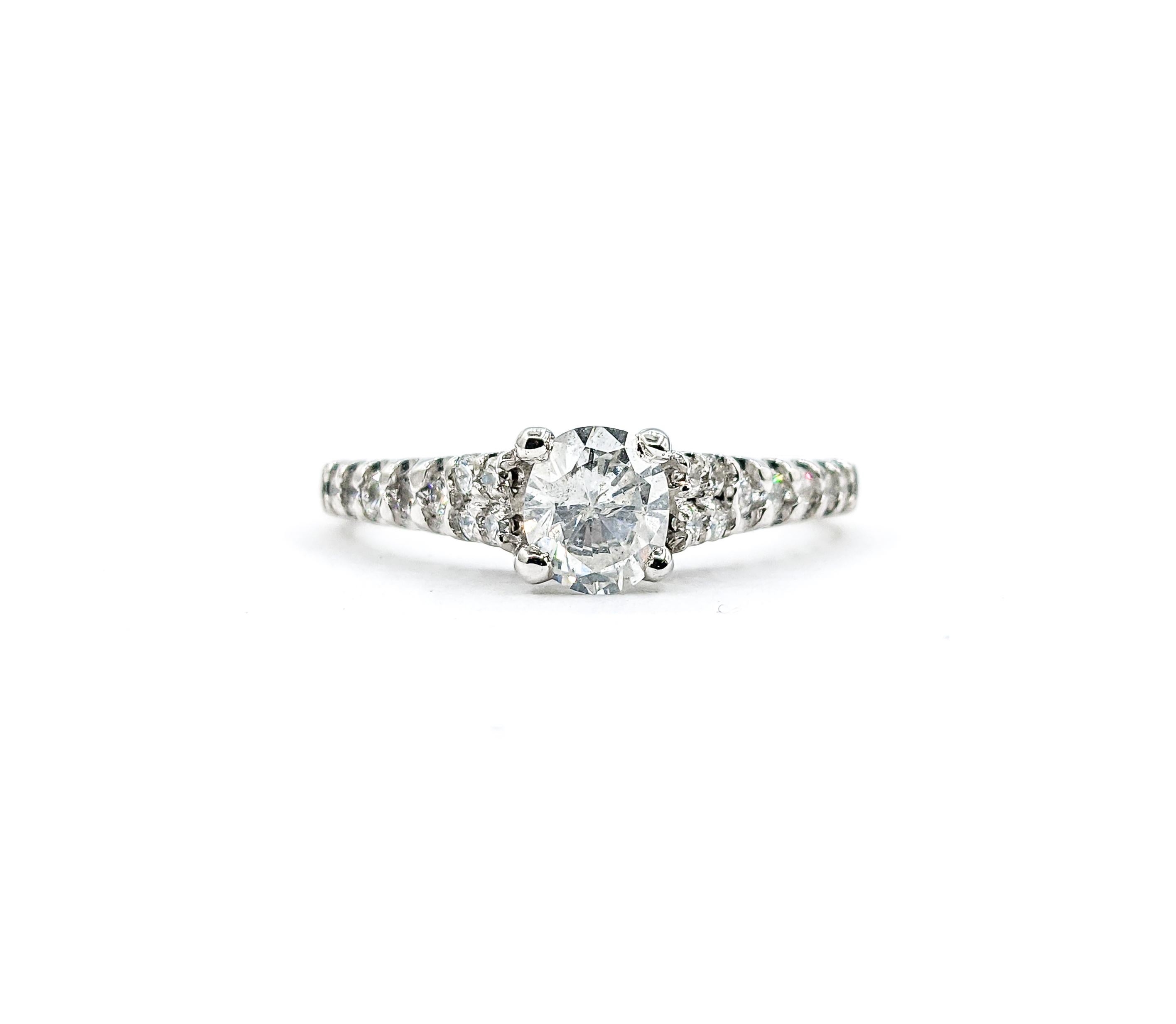 70ct Oval Diamond Centerpiece & Diamond Ring In White Gold

Embrace sophistication with this stunning ring, crafted in lustrous 14kt white gold and showcasing a .70ct oval diamond that glistens with I clarity and a near colorless white radiance.