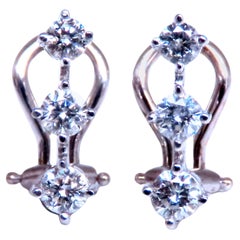 . Pendientes de clip con tres hileras de diamantes de 0,70 ct, 14 kt, 12493*