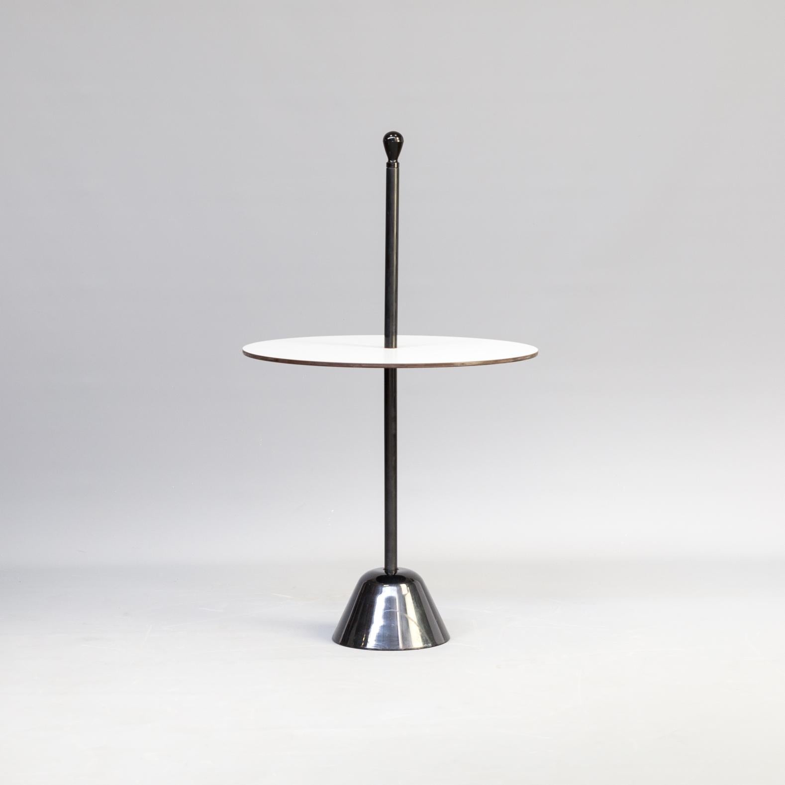 1970s Achille Castiglioni ‘Servomuto’ side table for Zanotta. An everlasting object whose shape perfectly matches its function. It has a stabile base with a very limited hindrance; a thin vertical pole with a knob at the top to hold it and a round