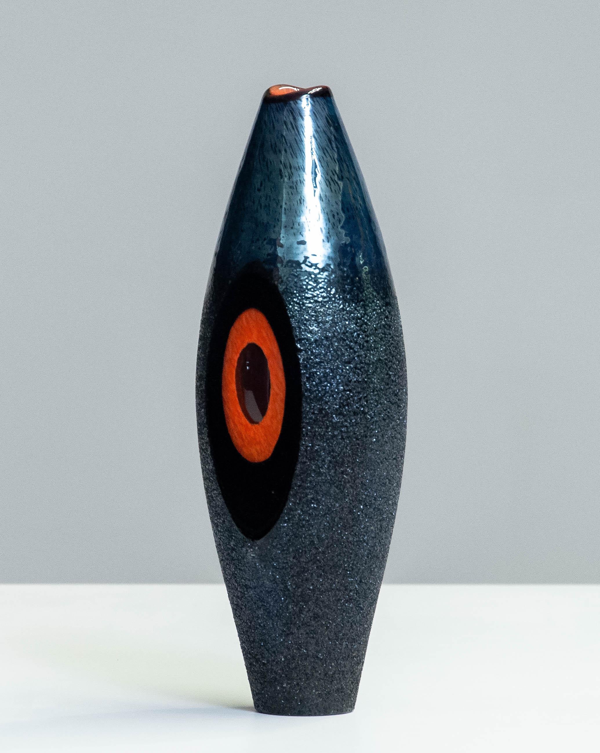 Beautiful piece of art glass shaped into a vase for the collection 'Moonlanding' made by and in the studio of Monica Backström for Kosta Boda Sweden.
Signed underneath and in allover very good condition.