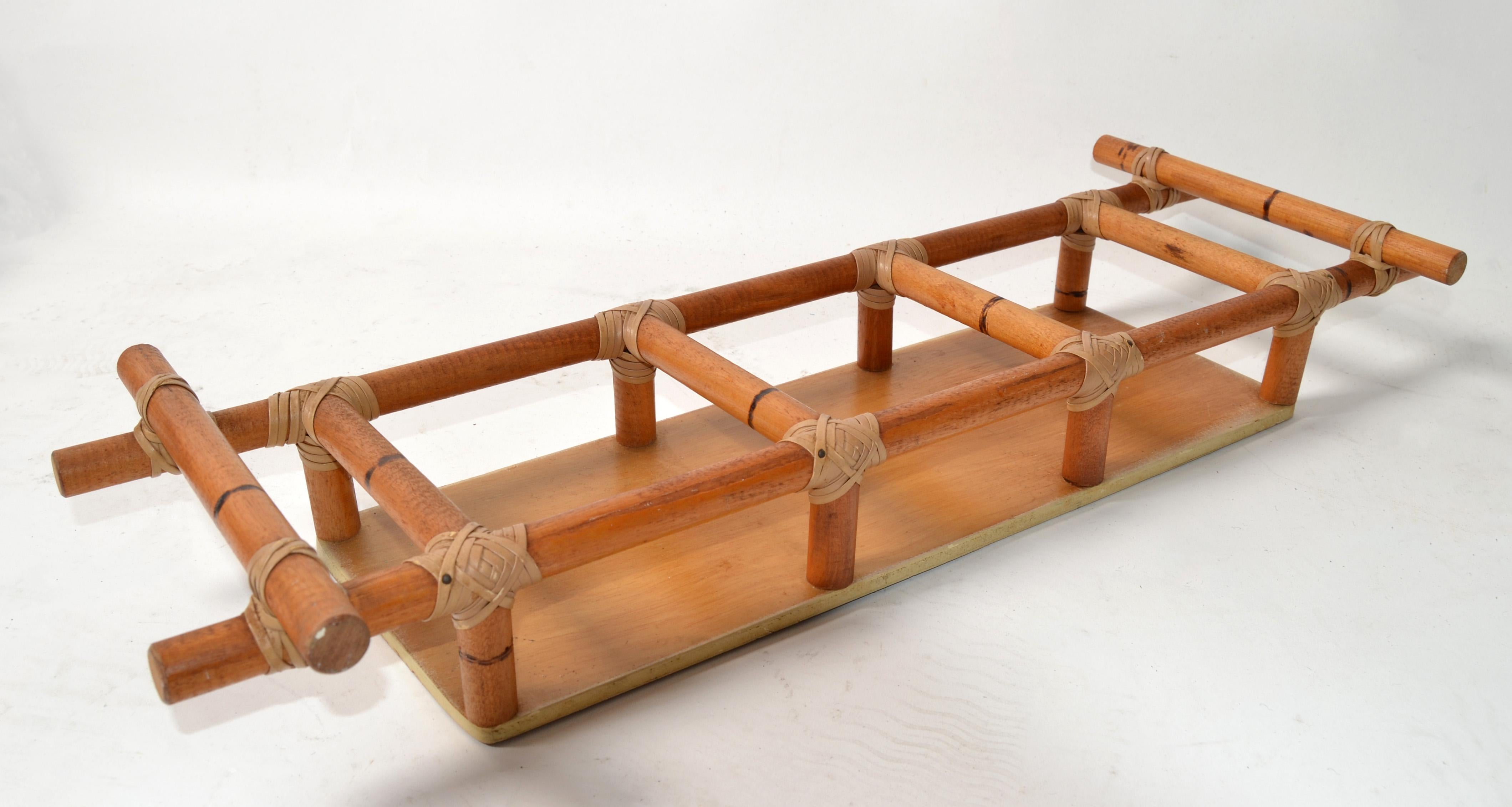 Vintage Boho Chic Mid-Century Modern Burnt Bamboo, Wood and hand-woven leather Bindings rectangle Kitchen Serving Tray, Spice Rack or Breakfast Platter.
The Storage Tray provides 3 compartments for Oil, Vinegar and Mustard or Honey, Jelly and