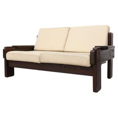 70's Brutalist Wood Framed Loveseat with Cream Leather Seating