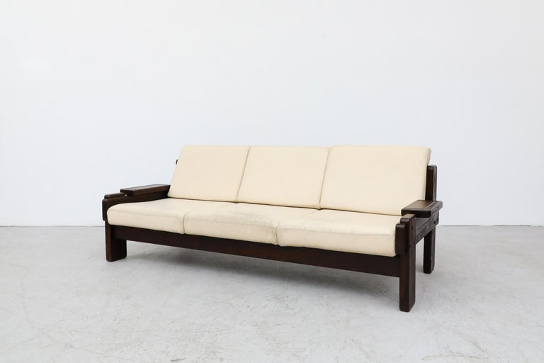 Mid-Century Modern 70's Brutalist Wood Framed Sofa with Cream Leather Cushions For Sale