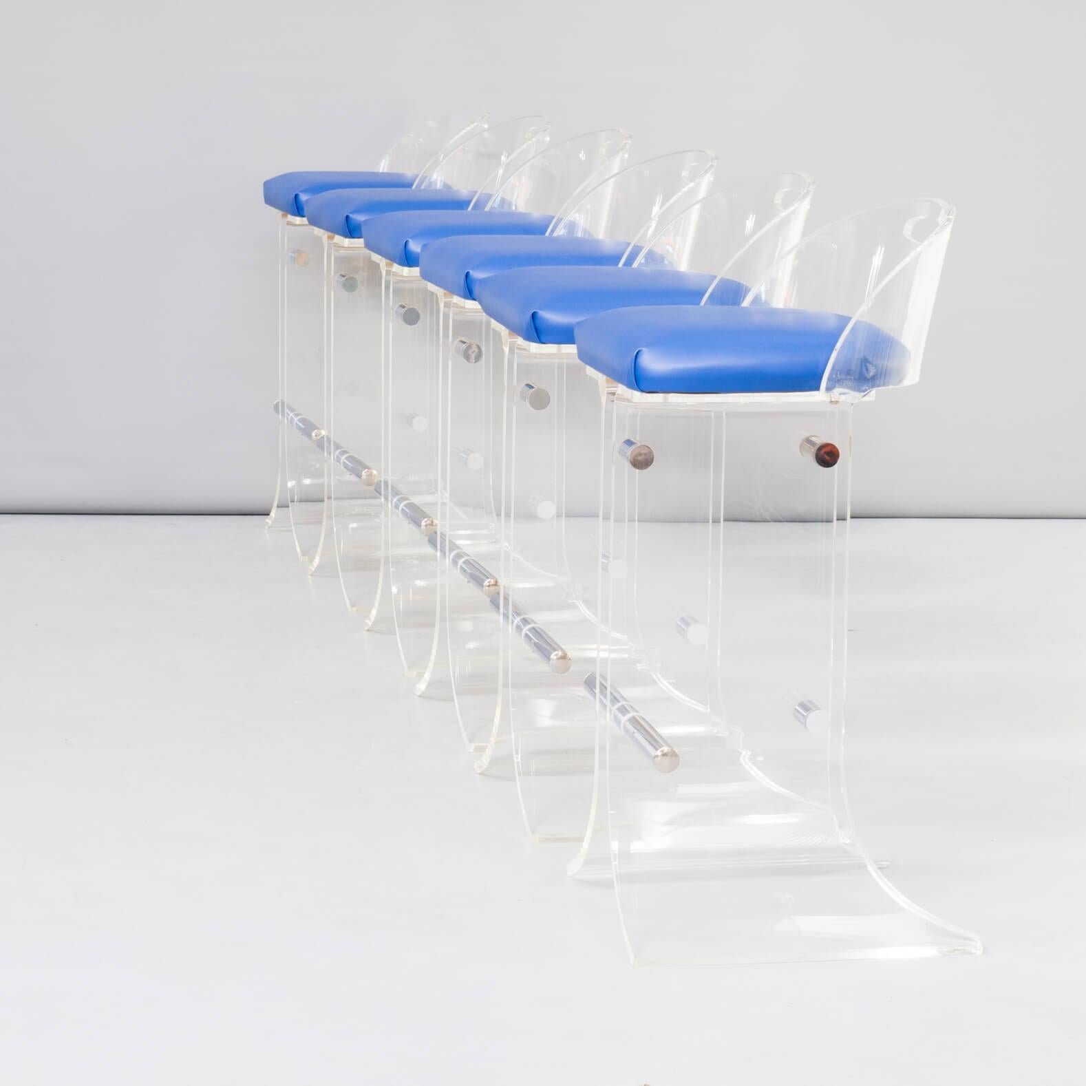 This amazingly beautiful and heavy set of six bar stools show a design of the early 1970s and the used materials show the exclusiveness of the item. Detailed production with see through Perspex combines leather and chrome as part of the most luxury