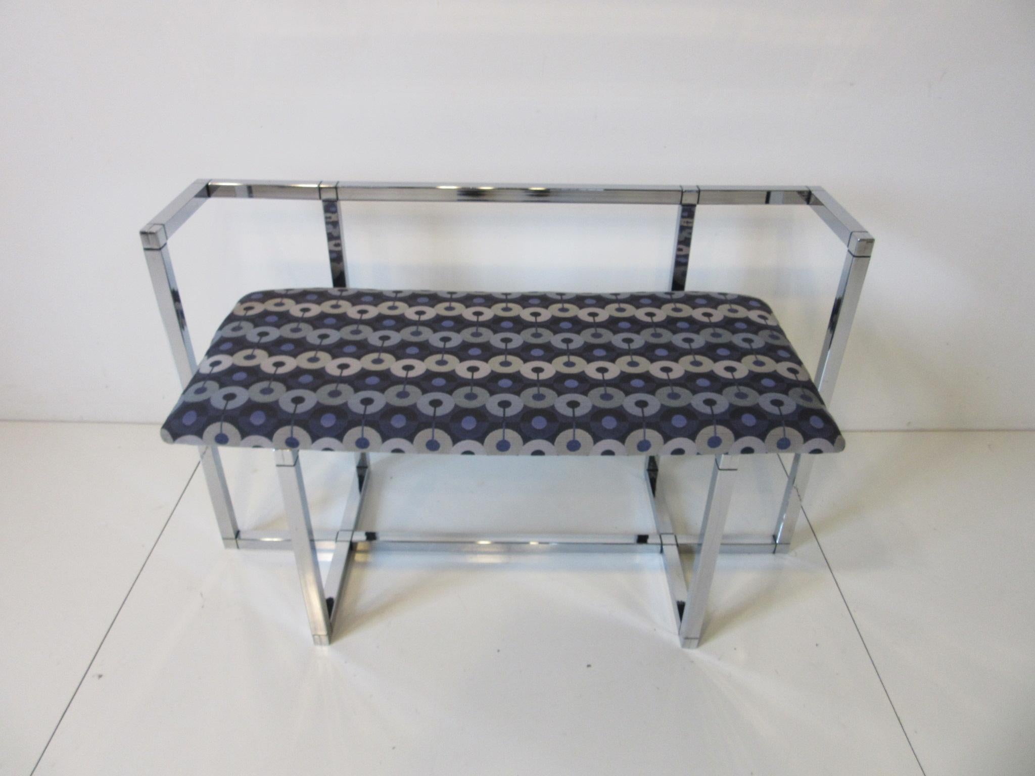 A smaller scale 1970s chrome framed bench / settee with back and elbow arms having an upholstered seat, this is the perfect piece for that entrance area or the spot where a console table would be used.