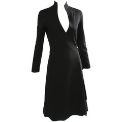 robe portefeuille en jersey noir Clovis Ruffin des années 70 avec col en col de cygne Vintage Sz 7/8