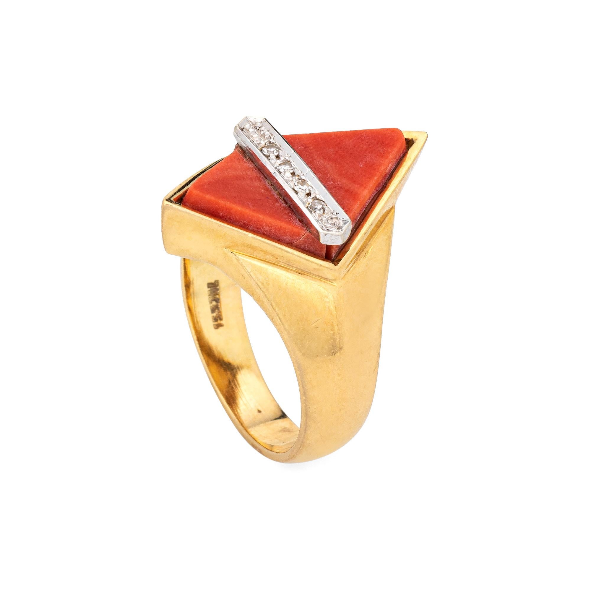Stylish vintage coral & diamond cocktail ring crafted in 18 karat yellow gold (circa 1970s). 

Coral measures 10mm x 7mm, accented with an estimated 0.02 carats of diamonds (estimated at I-J color and SI1-2 clarity) Note: few chips to the coral