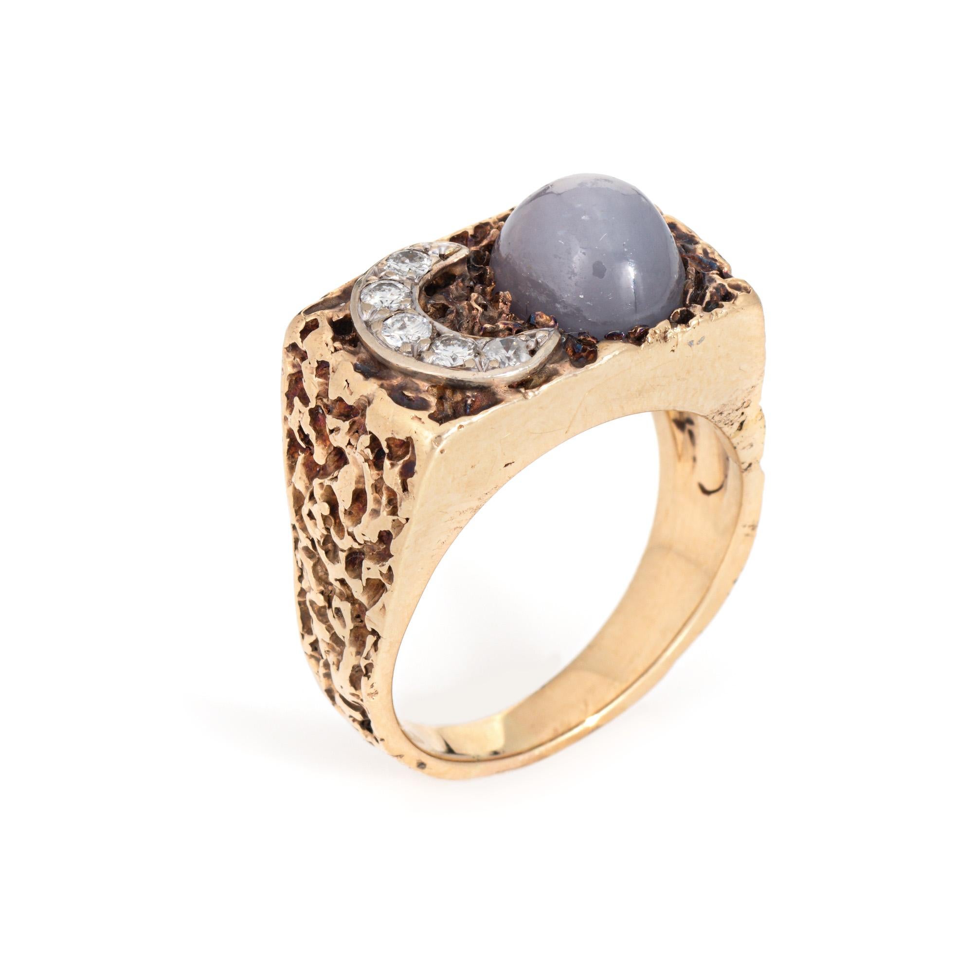 Stylish vintage diamond crescent moon and star sapphire ring crafted in 14 karat yellow gold (circa 1970s). 

5 diamonds total an estimated 0.10 carats (estimated at H-I color and SI1-I1 clarity). The star sapphire measures 9mm x 7.5mm. Note: the
