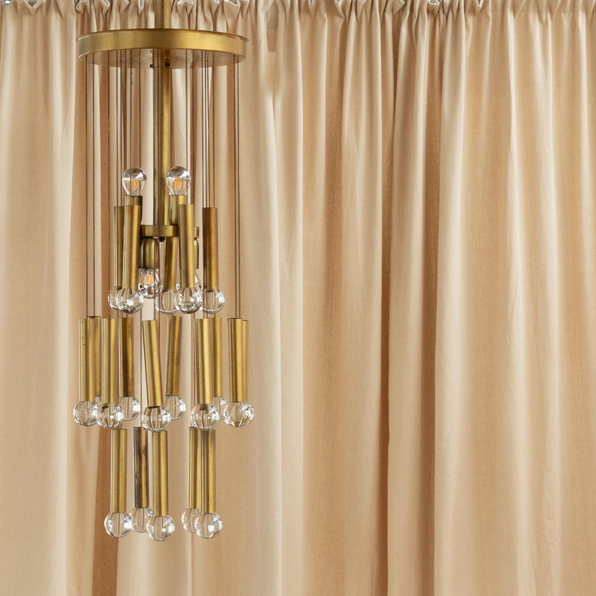 Metal 70s gold brass chain chandelier with glass globes For Sale