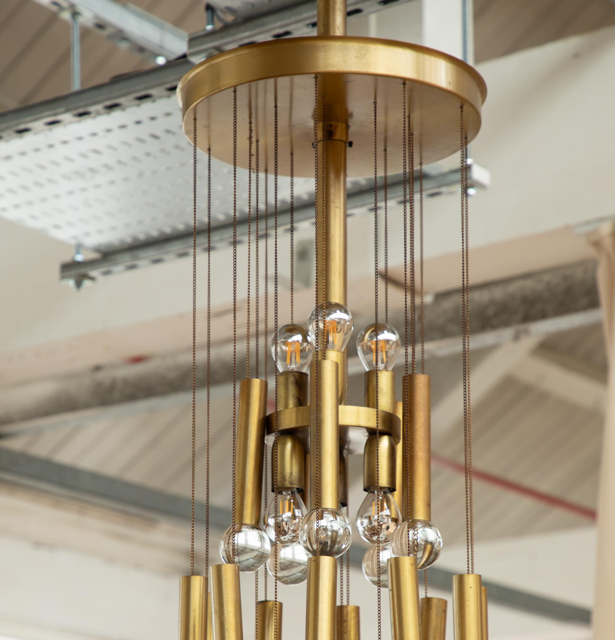 70s gold brass chain chandelier with glass globes For Sale 1