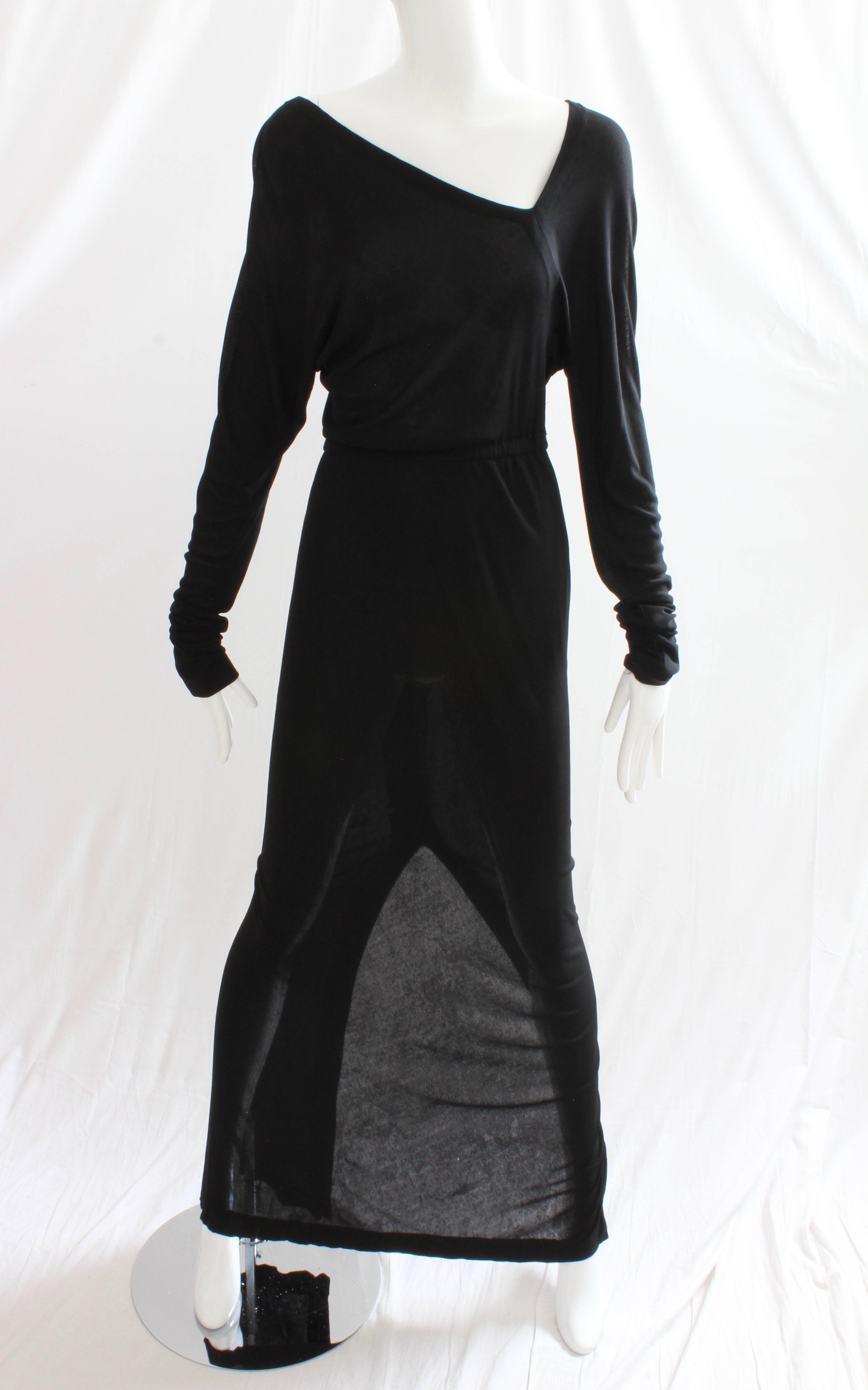 This long and sexy black silk jersey dress was made by HALSTON in 1975, and the same dress in purple can be seen at the Museum of Fine Arts in Boston collection (see image 10). In excellent shape for its 40+ years of age, we note two small repairs