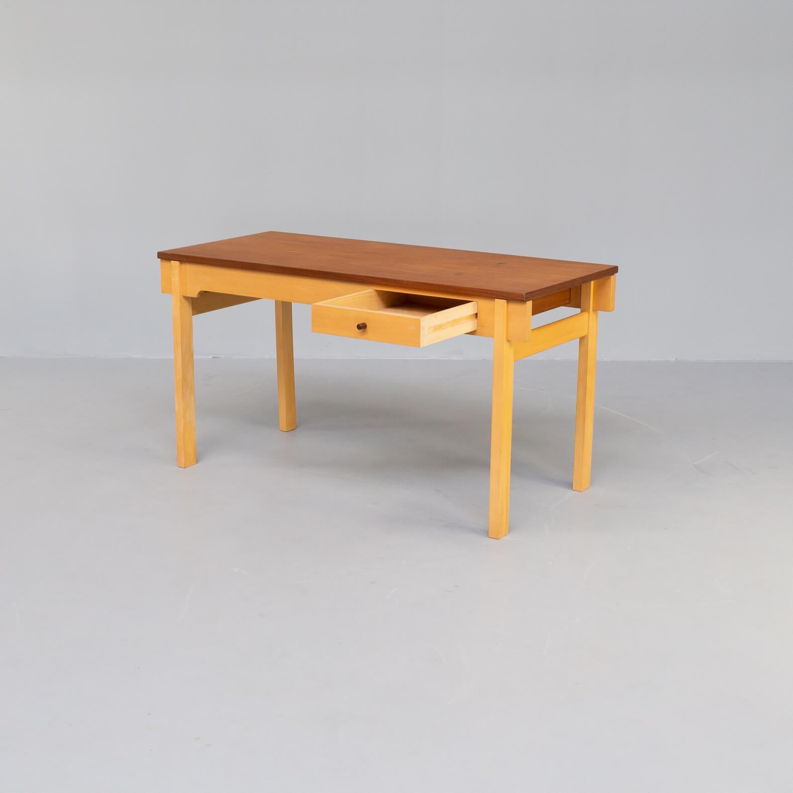 Beautiful teak and oak wooden table or desktable designed in the sixties for Andreas Tuck by a Dannish designer Hans J. Wegner. Andreas Tuck was the furniture producer that made the modern Danish furniture design known worldwide by its cooperation