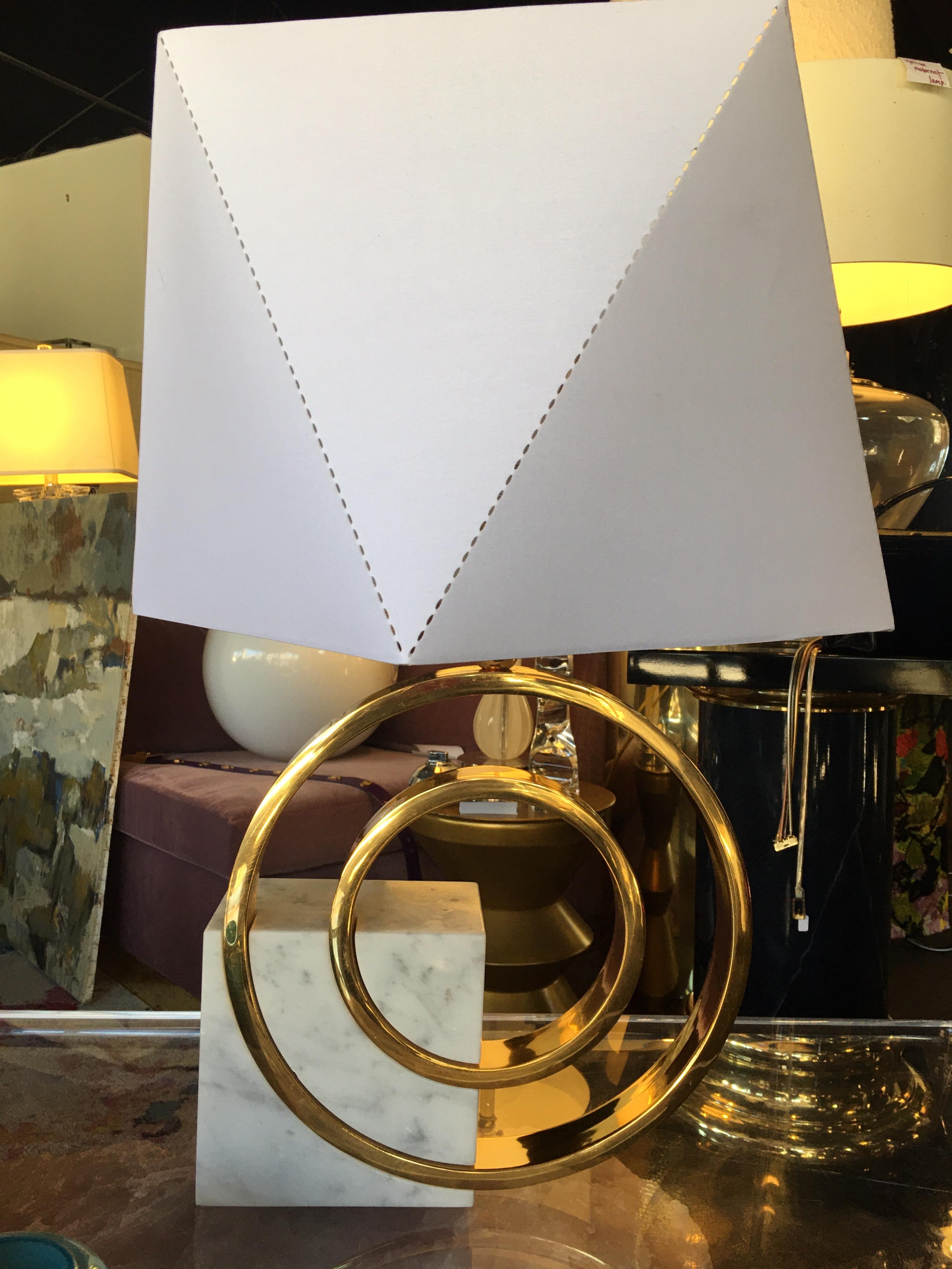 This is very rare and beautiful Italian modern lamp was designed by Giovani Banci in the 1970s. This lamp is made of white Carrara marble and beautiful brass. A new custom shade has been made for the lamp in the style of geometric modern art. From a