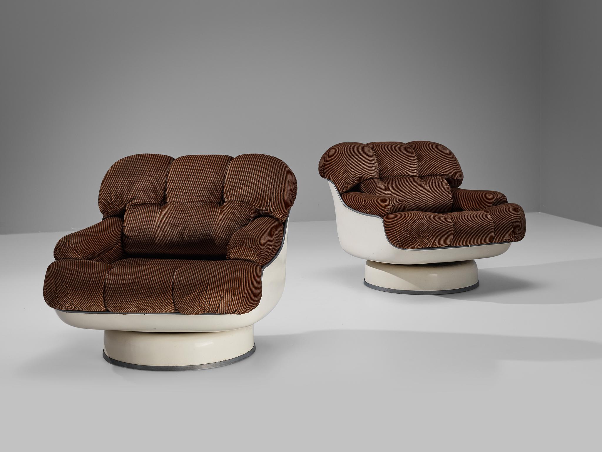 Pair of easy chairs, fabric, fiberglass, rubber, Italy, 1970s.

This design truly resembles the ethos of the seventies, featuring the commonly used material of that time named fiberglass in combination with a soft striped upholstery composed of