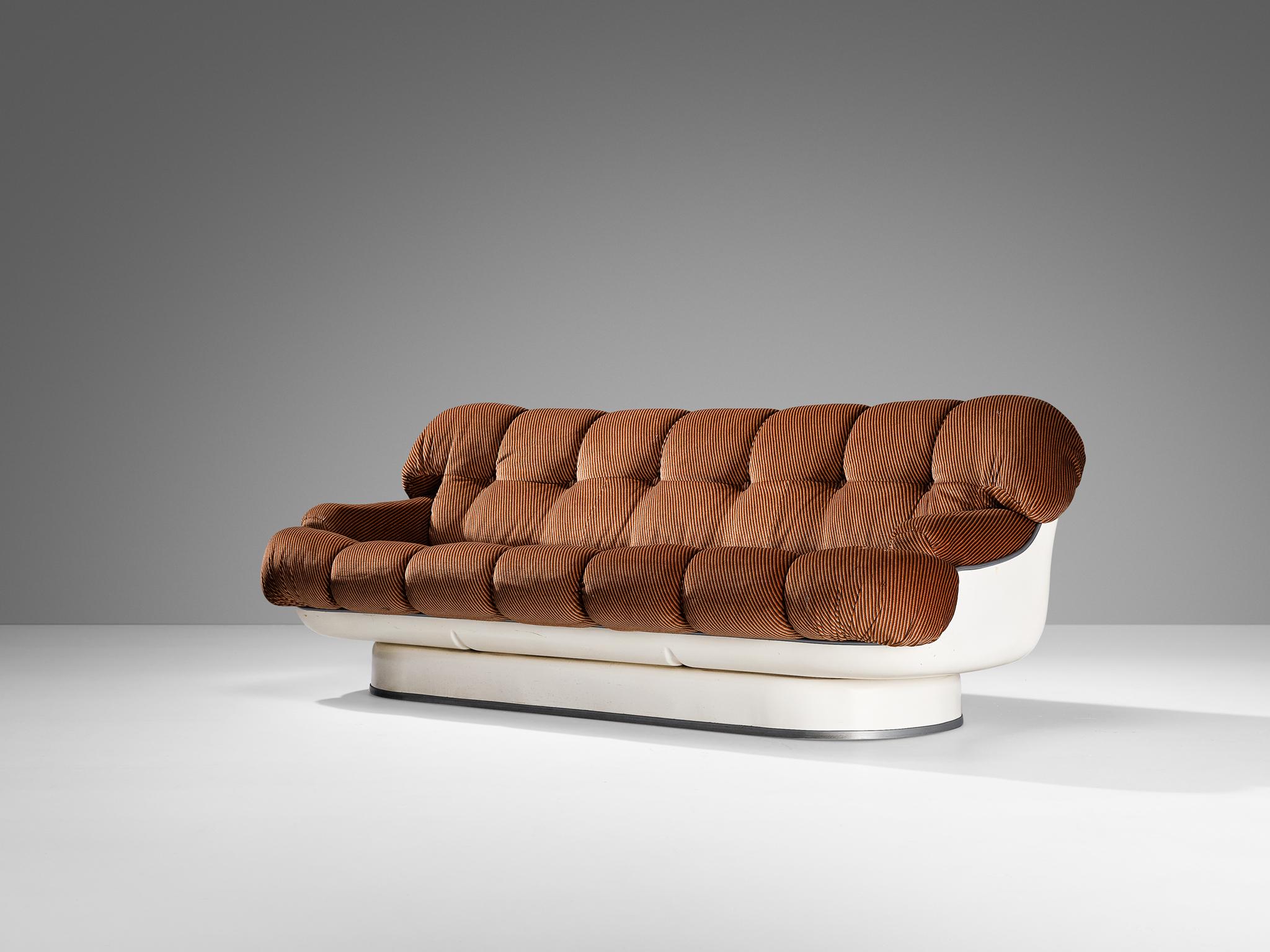 Sofa, fabric, fiberglass, rubber, Italy, 1970s.

This design truly resembles the ethos of the seventies, featuring the commonly used material of that time named fiberglass in combination with a soft striped upholstery composed of beige, light brown