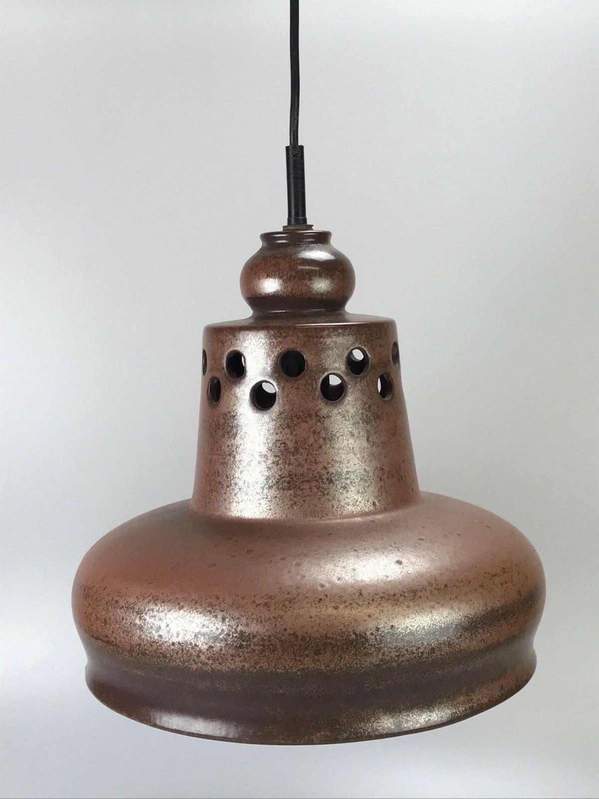 70s lamp light ceiling lamp ceramic mid century space age brown

Object: ceiling lamp

Manufacturer:

Condition: good

Age: around 1960-1970

Dimensions:

Diameter = 33cm
Hanging height = 116cm

Other notes:

The pictures serve as