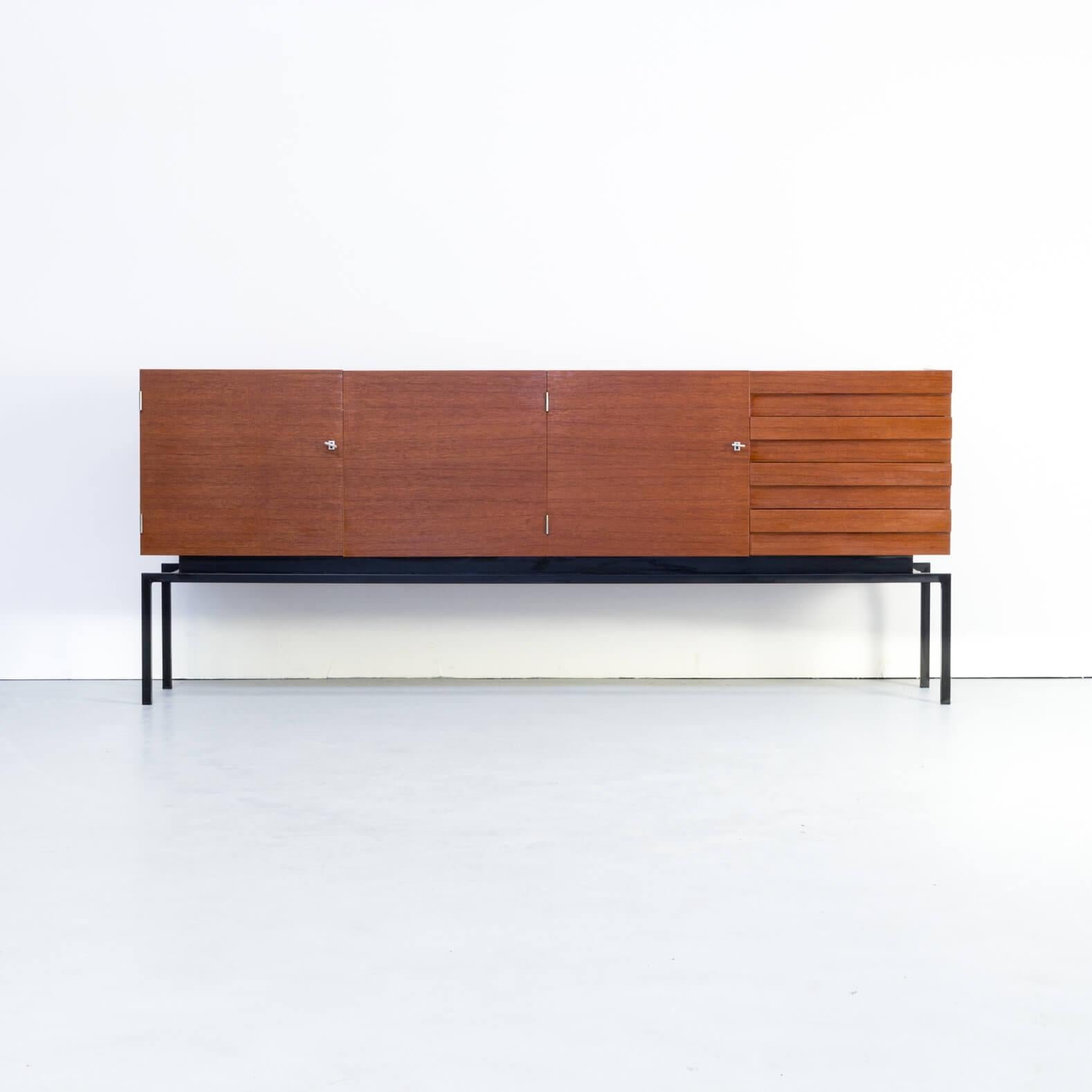 1970s Leo Bub teak sideboard for Bub Wertmöbel. This beautiful ‘floating’ sideboard has 3 doors and 4 drawers. It rests on a black lacquered metal frame and is in good condition consistent with age and use.