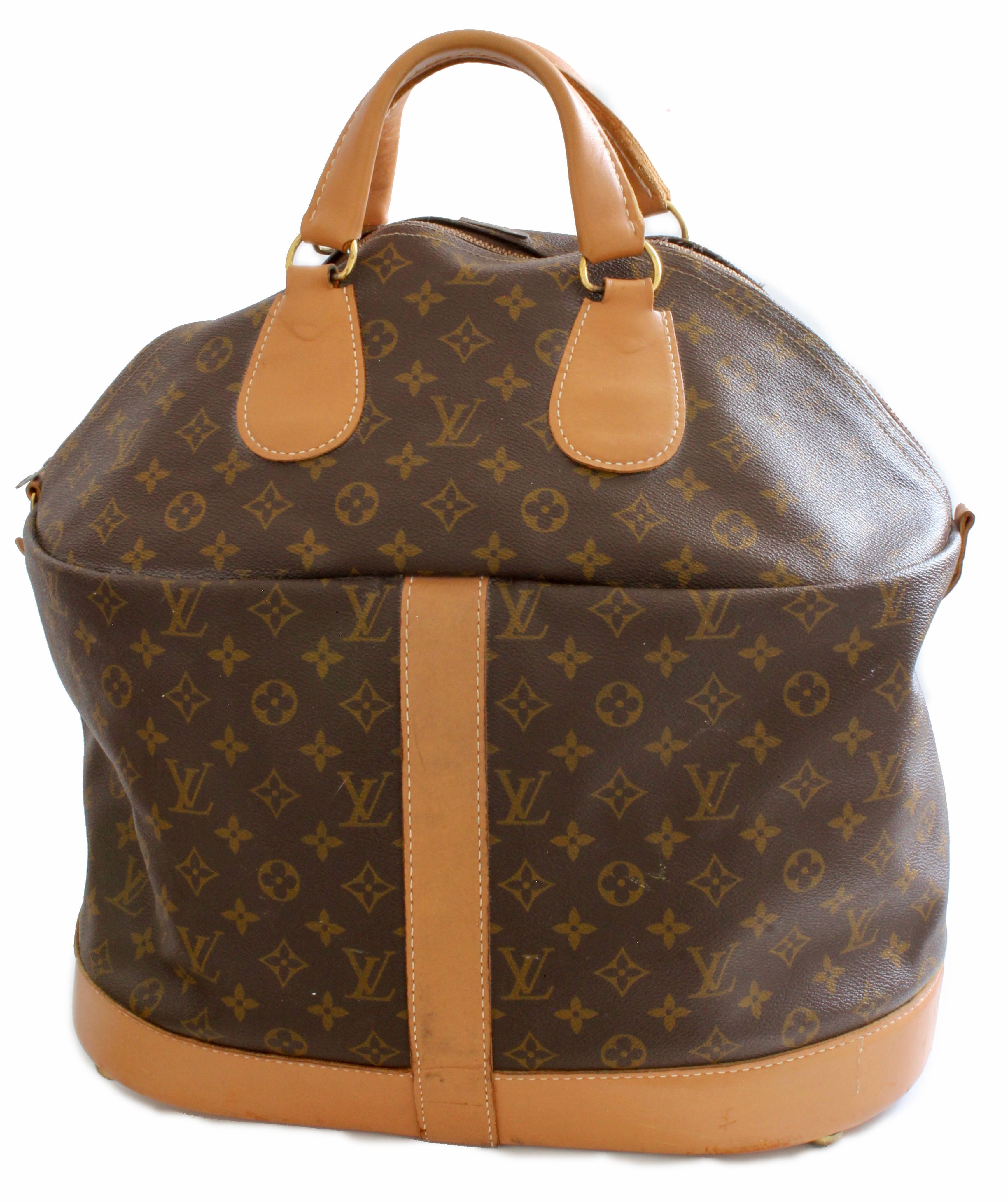 This large and very rare travel bag was originally sold by Saks 5th Ave and made under special license by The French Company for Louis Vuitton, long before LV had a boutique presence in the USA. Produced for only a short period, these incredible