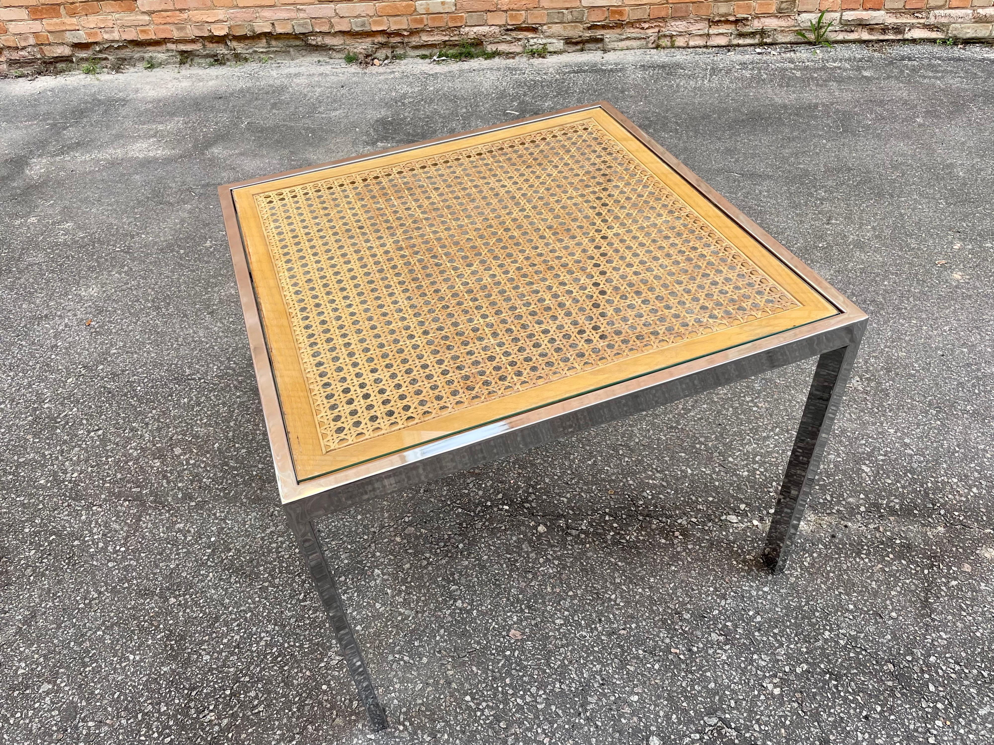 A table well suited as a breakfast, kitchen, or game table. A perfect size dining table, too, for a small urban apartment. This piece simultaneously strikes both warm and modern cords. Beautifully produced by Design Institute America, and well