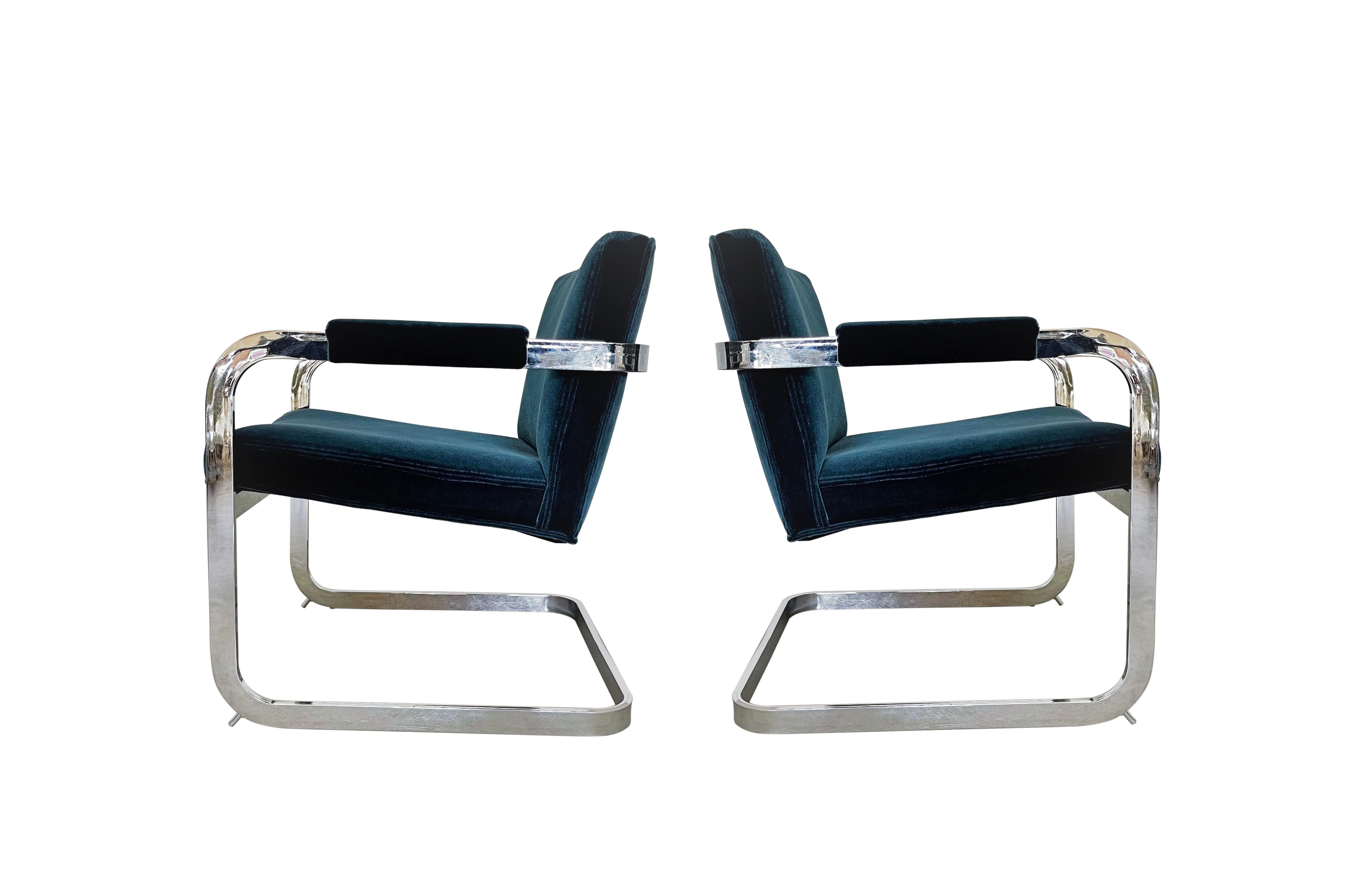 An attractive set of two side/armchairs designed by Milo Baughman for Thayer Coggin model #1188, are of mid-century form. Beautifully crafted chairs featuring soft padded backs, seats and armrests upholstered in a pacific blue mohair velvet over