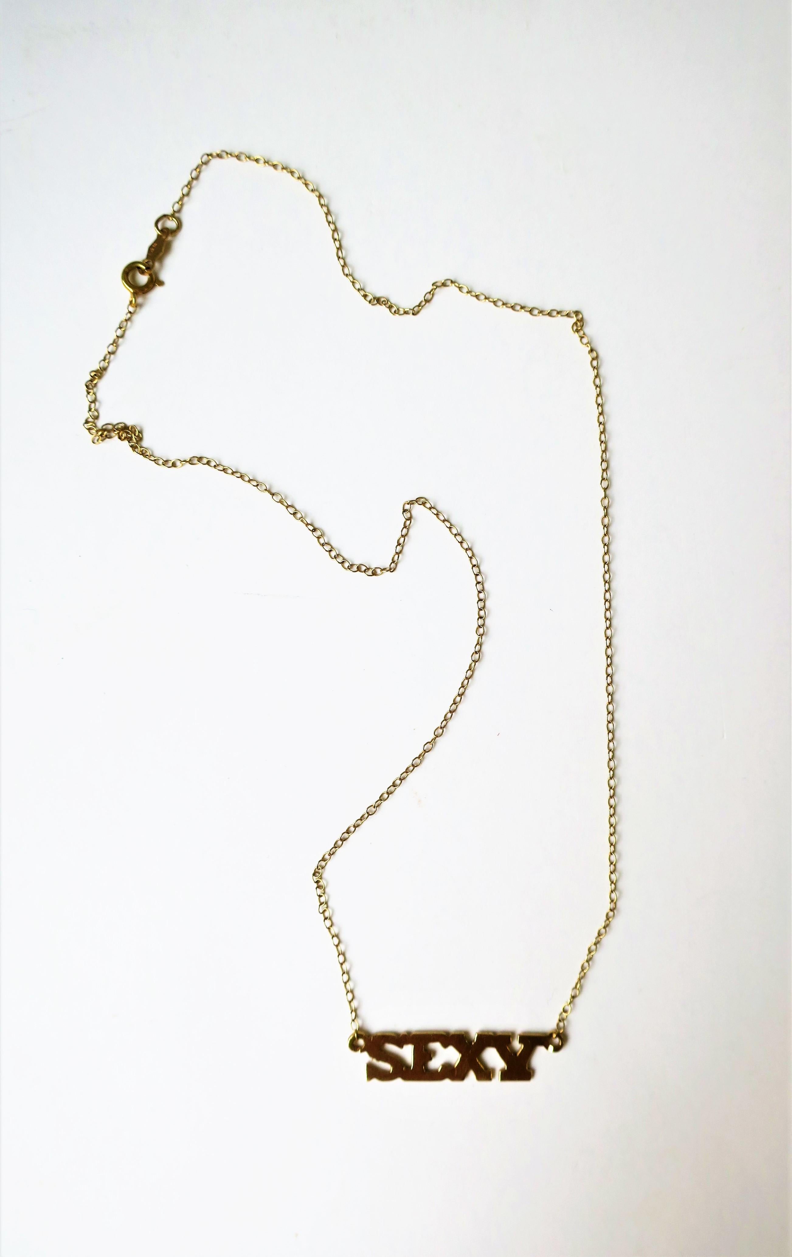 Sexy Nameplate Necklace 14-Karat Yellow Gold, circa 1970s Disco Era In Good Condition In New York, NY