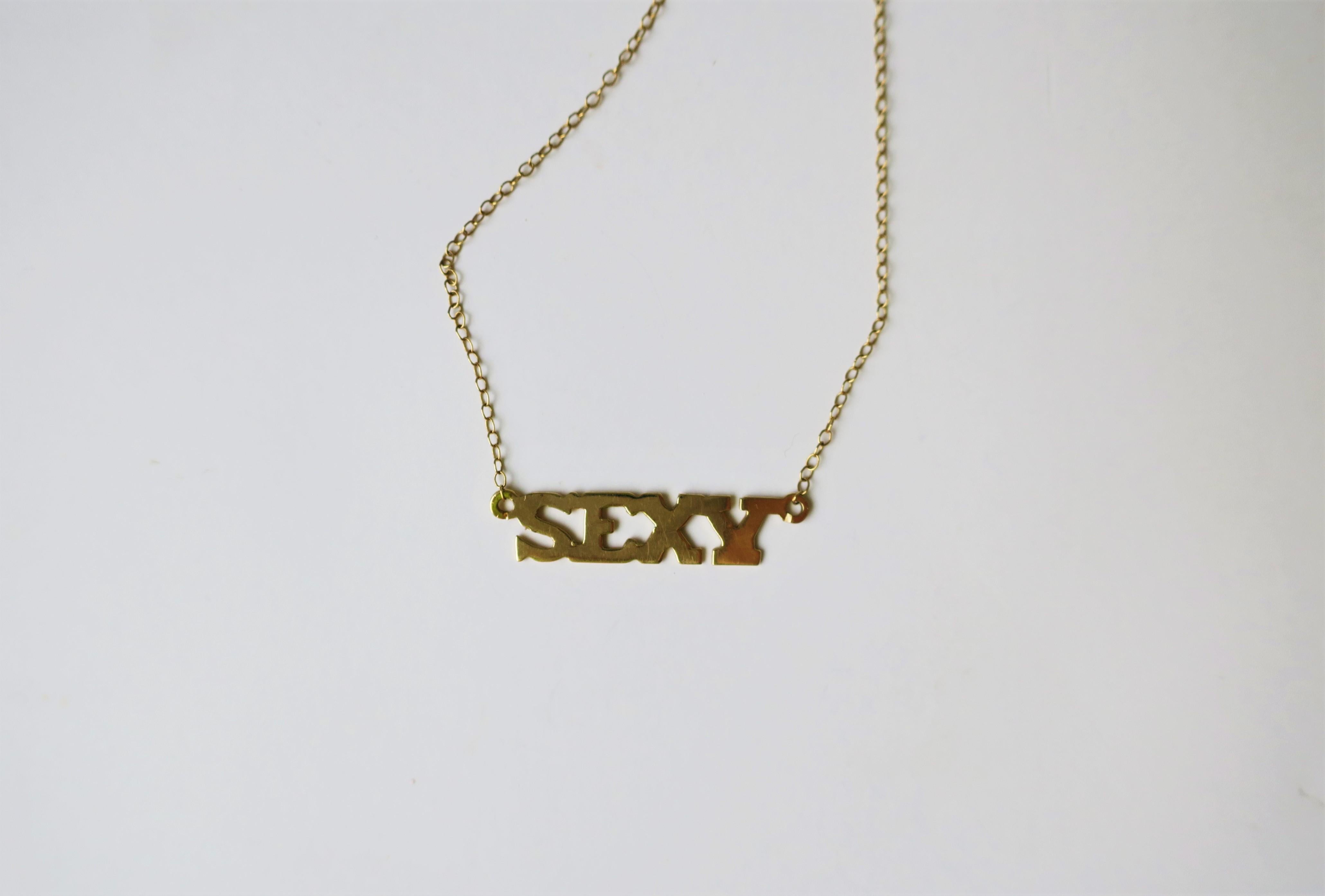 Late 20th Century Sexy Nameplate Necklace 14-Karat Yellow Gold, circa 1970s Disco Era