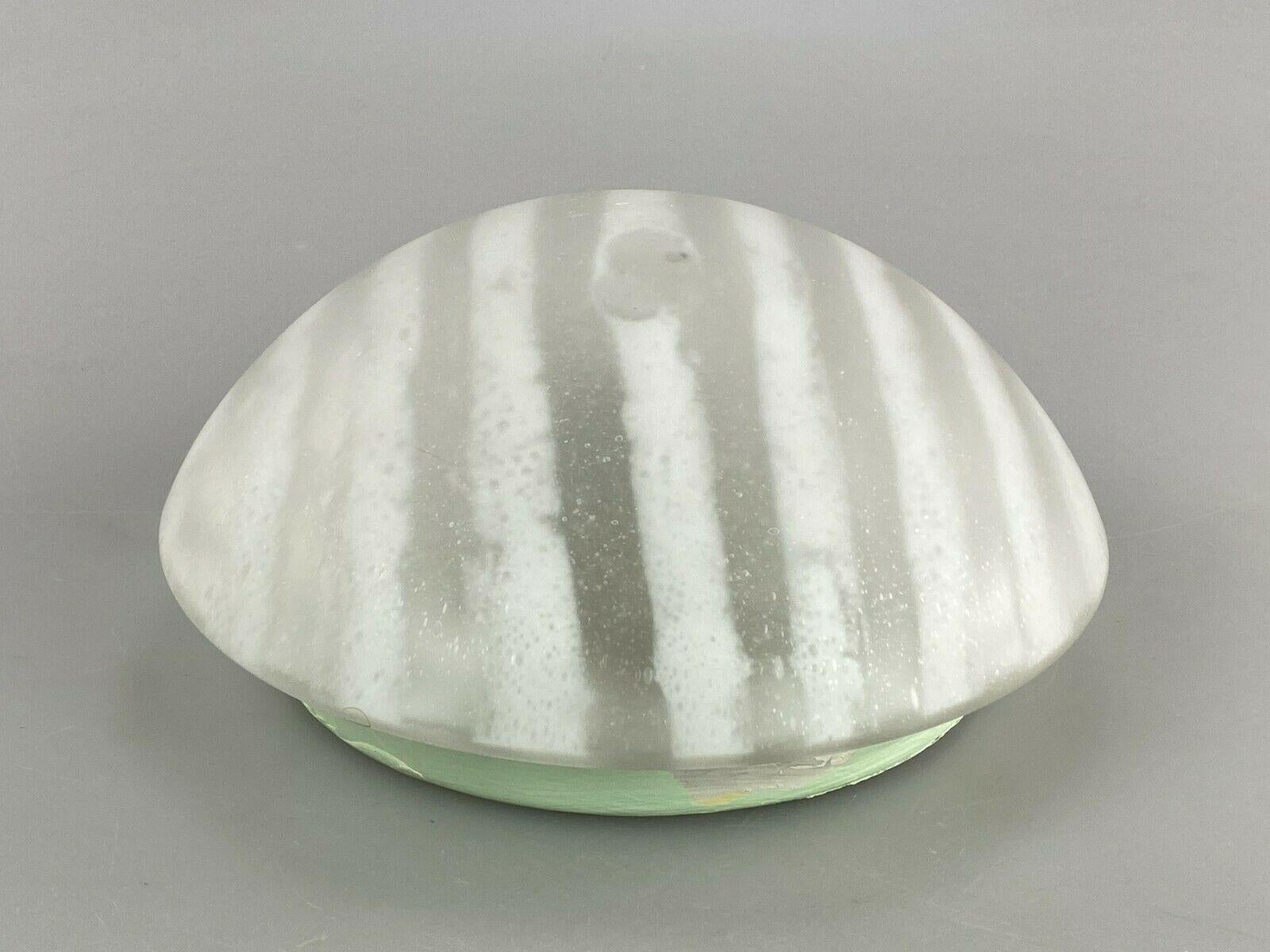 70s Peill & Putzler Plafoniere ceiling lamp glass space design lamp.

Object: lamp

Manufacturer: Peill & Putzler

Condition: good

Age: around 1960-1970

Dimensions:

Diameter = 22.5cm
Height = 10cm

Other notes:

The pictures
