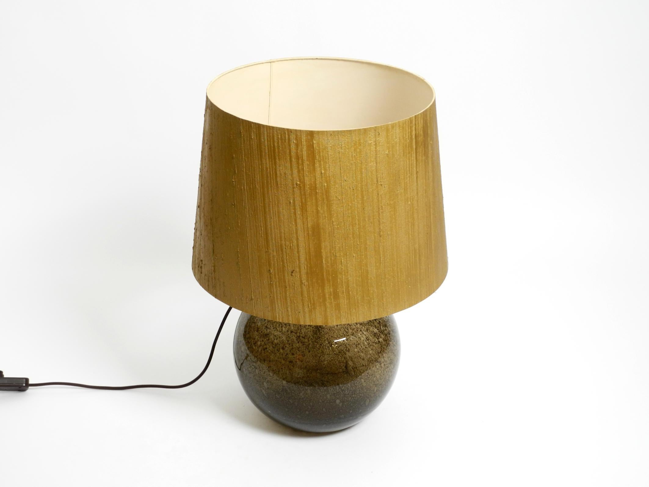 German 70s Putzler table lamp with illuminated glass body and shade made of dupion silk For Sale