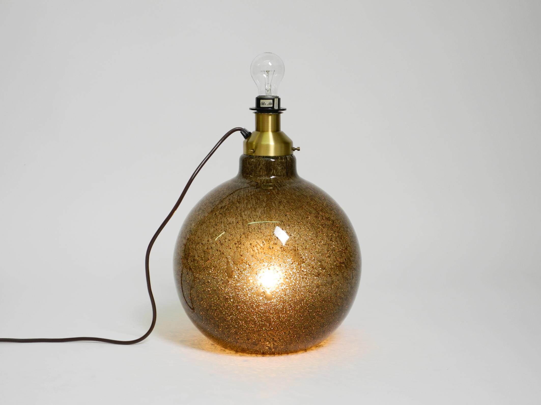Late 20th Century 70s Putzler table lamp with illuminated glass body and shade made of dupion silk For Sale