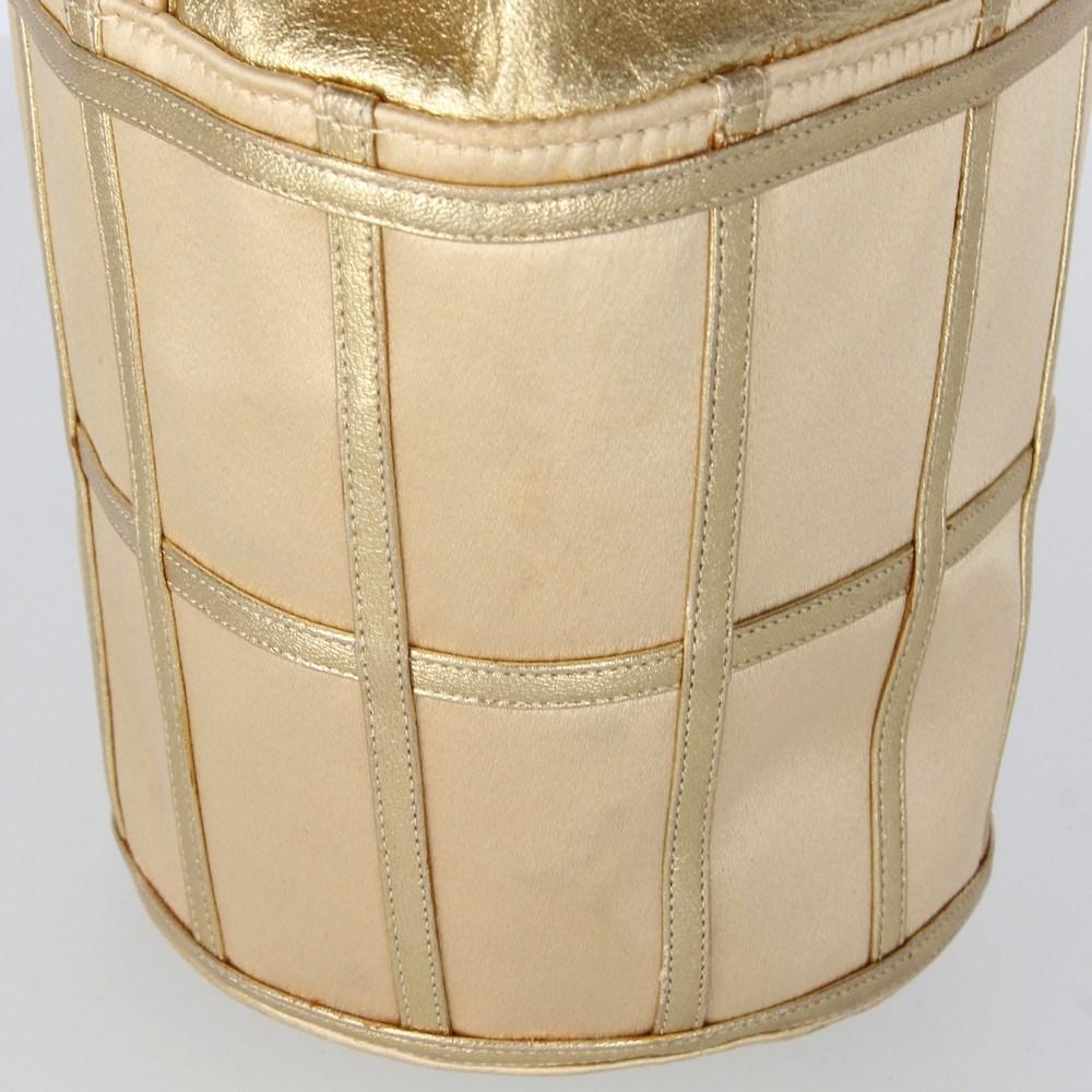 70s René Caovilla Vintage gold-tone leather bucket bag with silk satin details 1