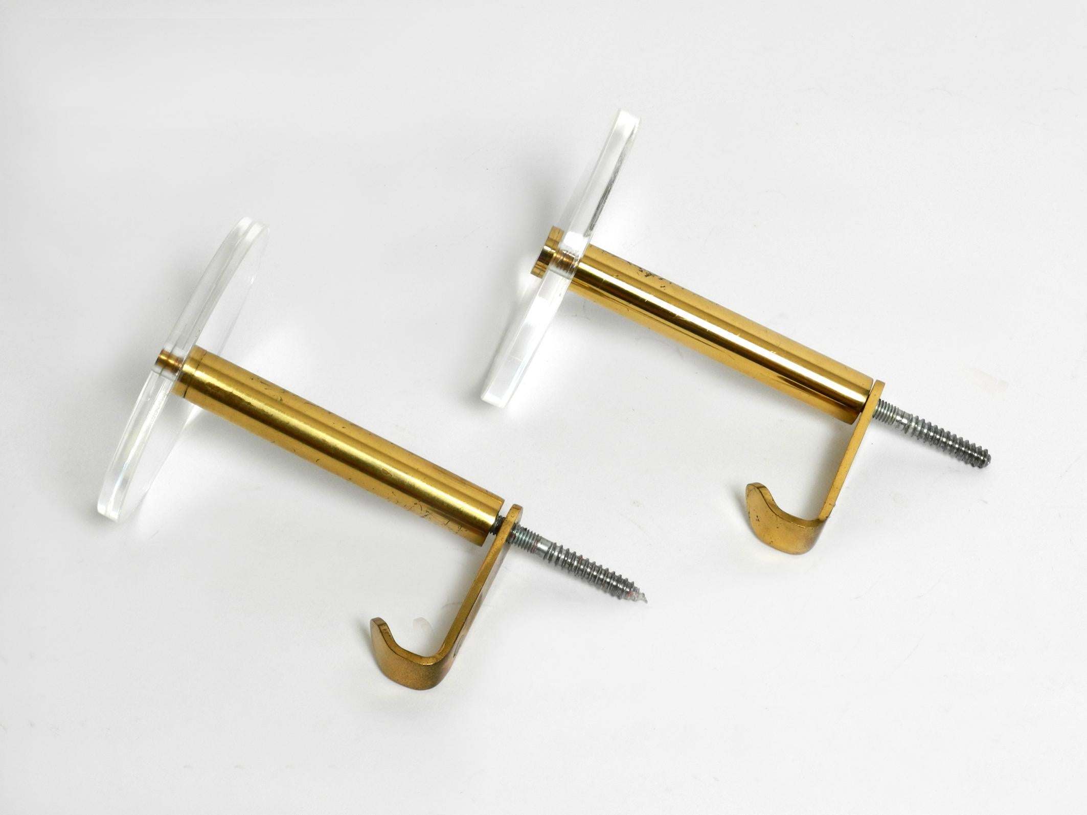 Late 20th Century 70s set of 2 brass and plexiglass coat rack wall hooks by Vereinigte Werkstätten