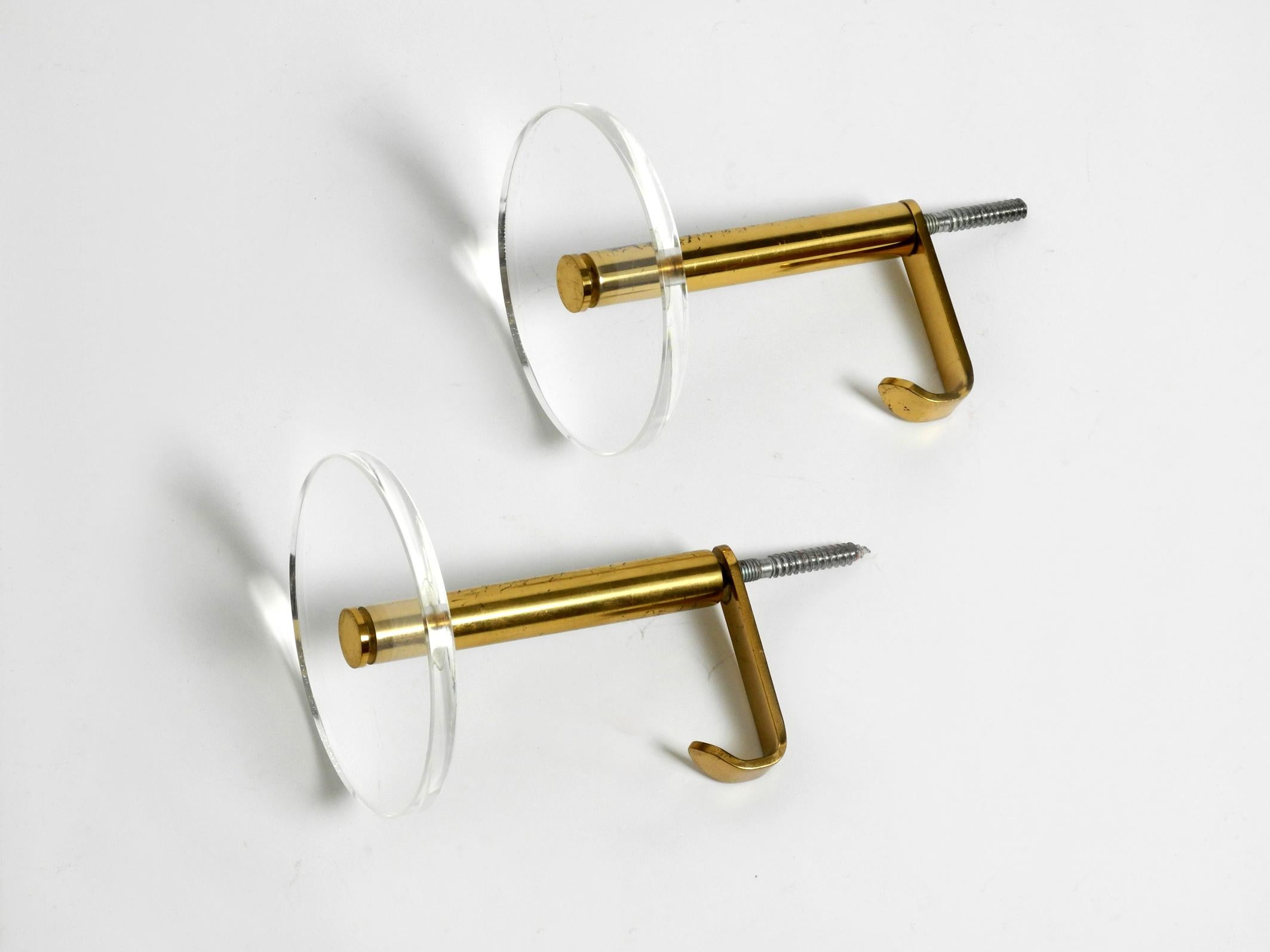 Brass 70s set of 2 brass and plexiglass coat rack wall hooks by Vereinigte Werkstätten