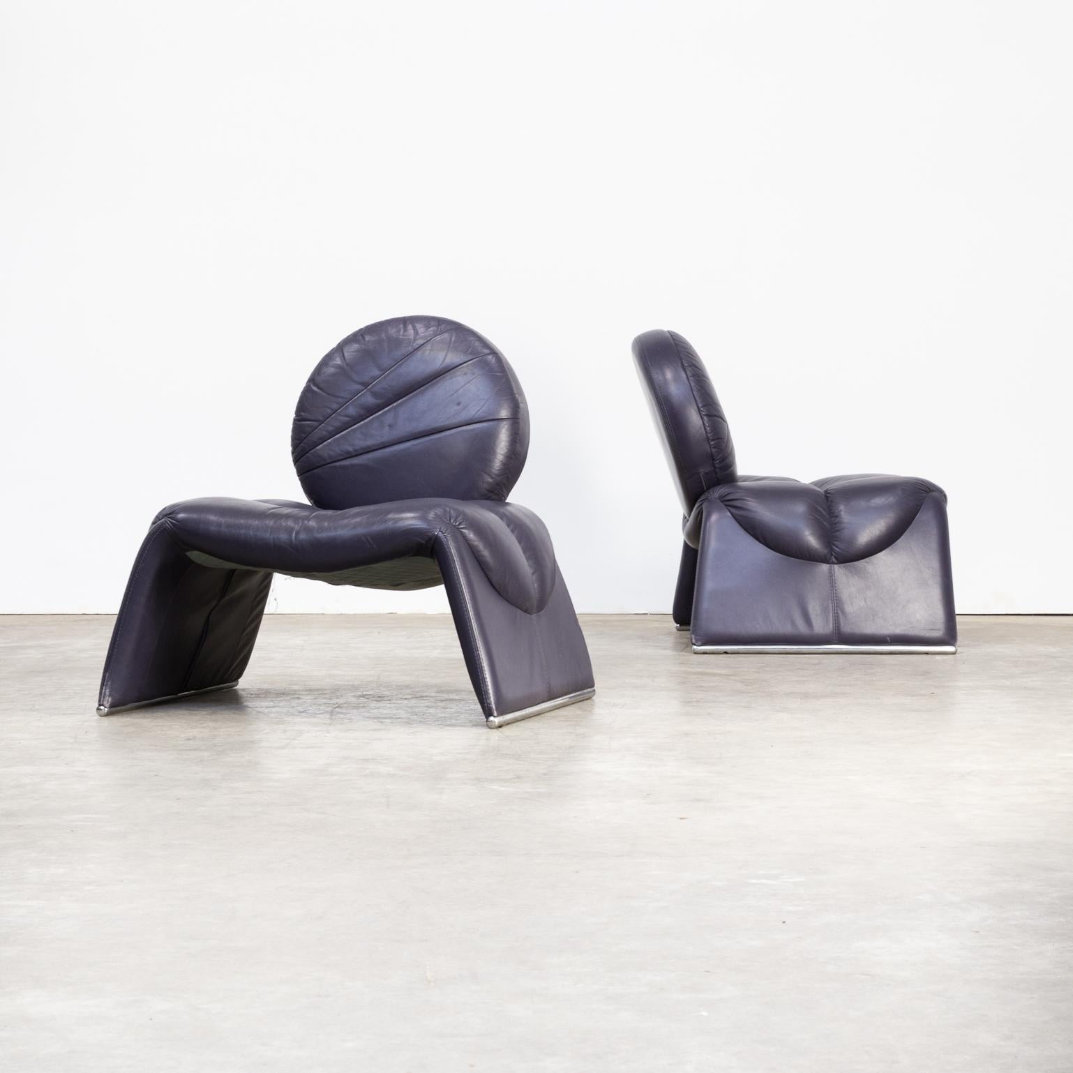 One lot of two leather ‘calipso c35’ design fauteuils attributed to Saporiti. Comfortable chair in blue purple leather. Good condition consistent with age and use.