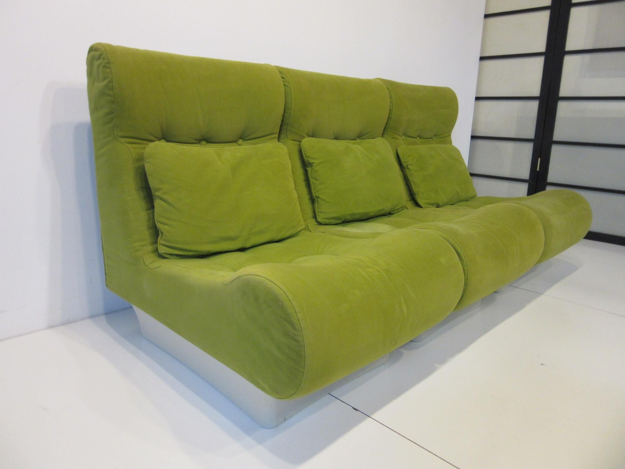 A well-constructed 3 piece loveseat, sofa with matching back pillows, off-white fiberglass bases and stitched design to the seats. The individual sections can be used as lounge chairs when not together and are extremely comfortable covered in a soft