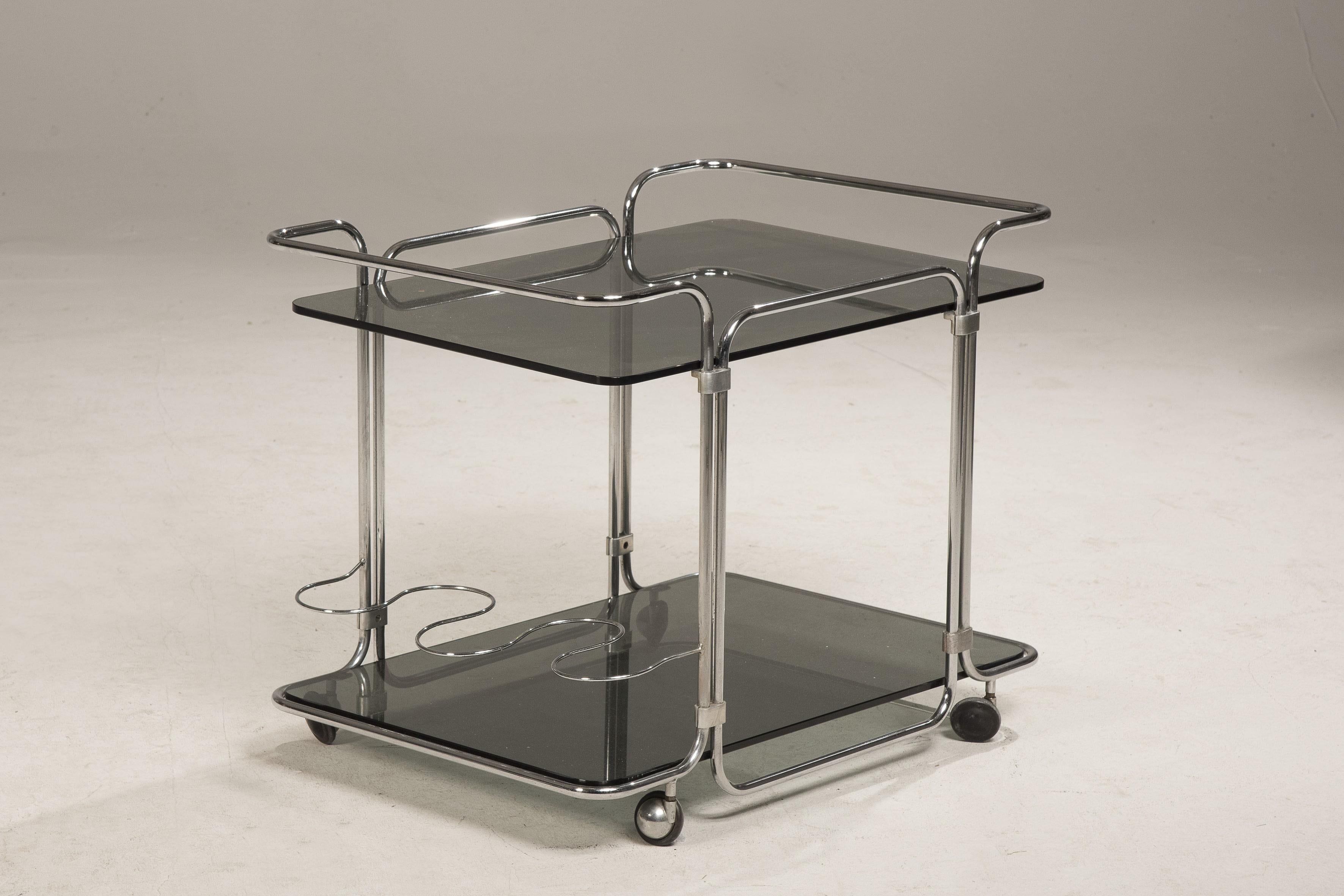 Late 20th Century 1970s Steel Wheeled Bottle Holders Two Smoked Glass Shelves Cart For Sale