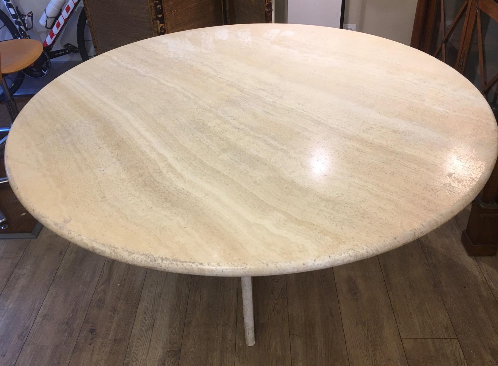 Round travertine table from the 70s, French manufacture, tripod travertine base separated from the top.