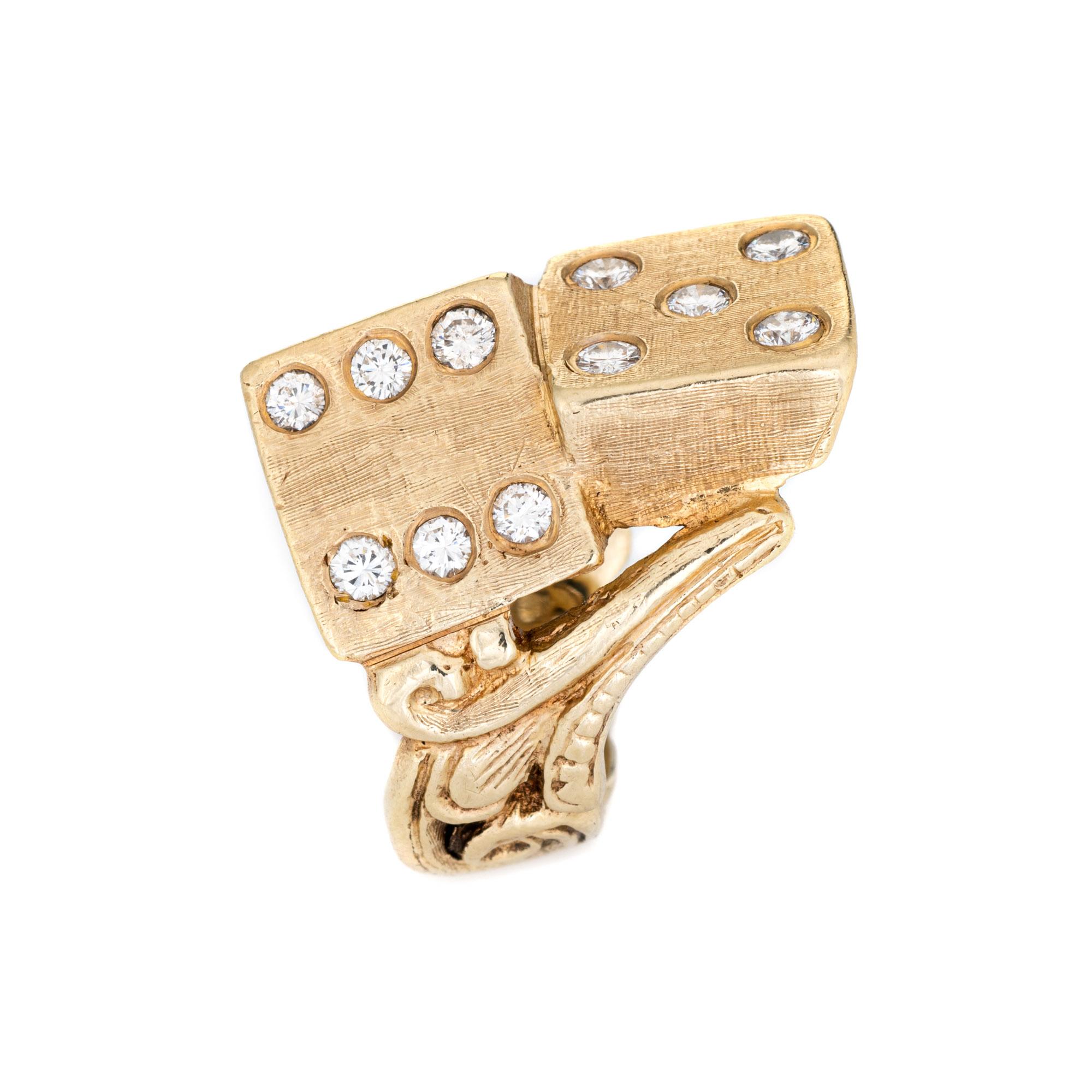 Finely detailed vintage diamond dice ring crafted in 14 karat yellow gold (circa 1970s). 

13 round brilliant cut diamonds total an estimated 0.65 carats (estimated at H-I color and VS2-I1 clarity).
The elaborate and beautifully detailed ring