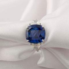 7.1 Carat Blue Sapphire Ring with Trapezoid Diamond Accents 18k White Gold