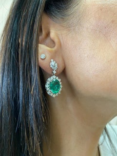 Sunita Nahata GRS Certified Emerald 7.10ct. Earrings in 18KWG with Diamond.