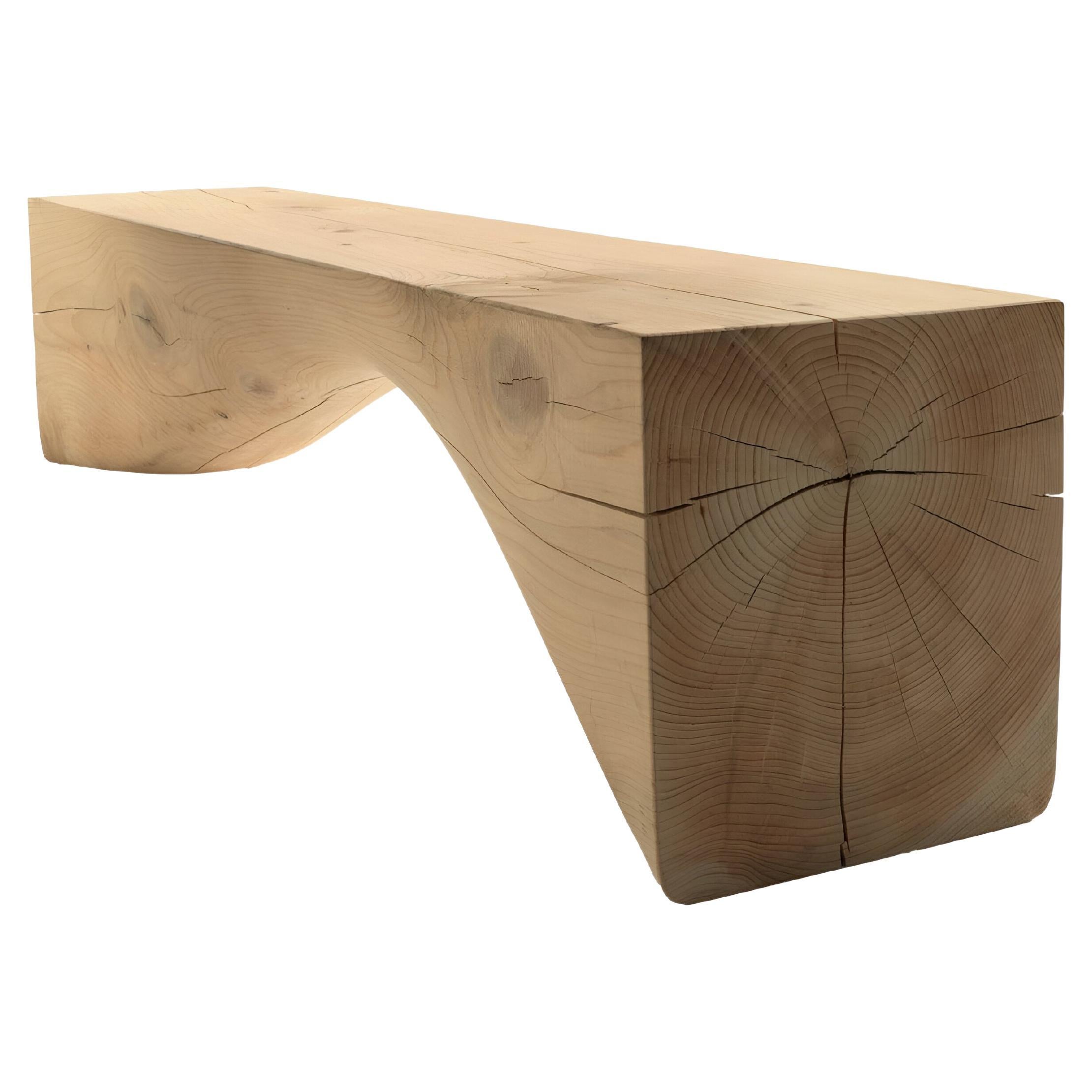 Experience the unique aroma of scented cedar with this bench, sculpted from a single piece of wood. Its graceful arched base below the seat magnifies the exquisite wood grains and natural color variations.
This bench is suitable for indoor and